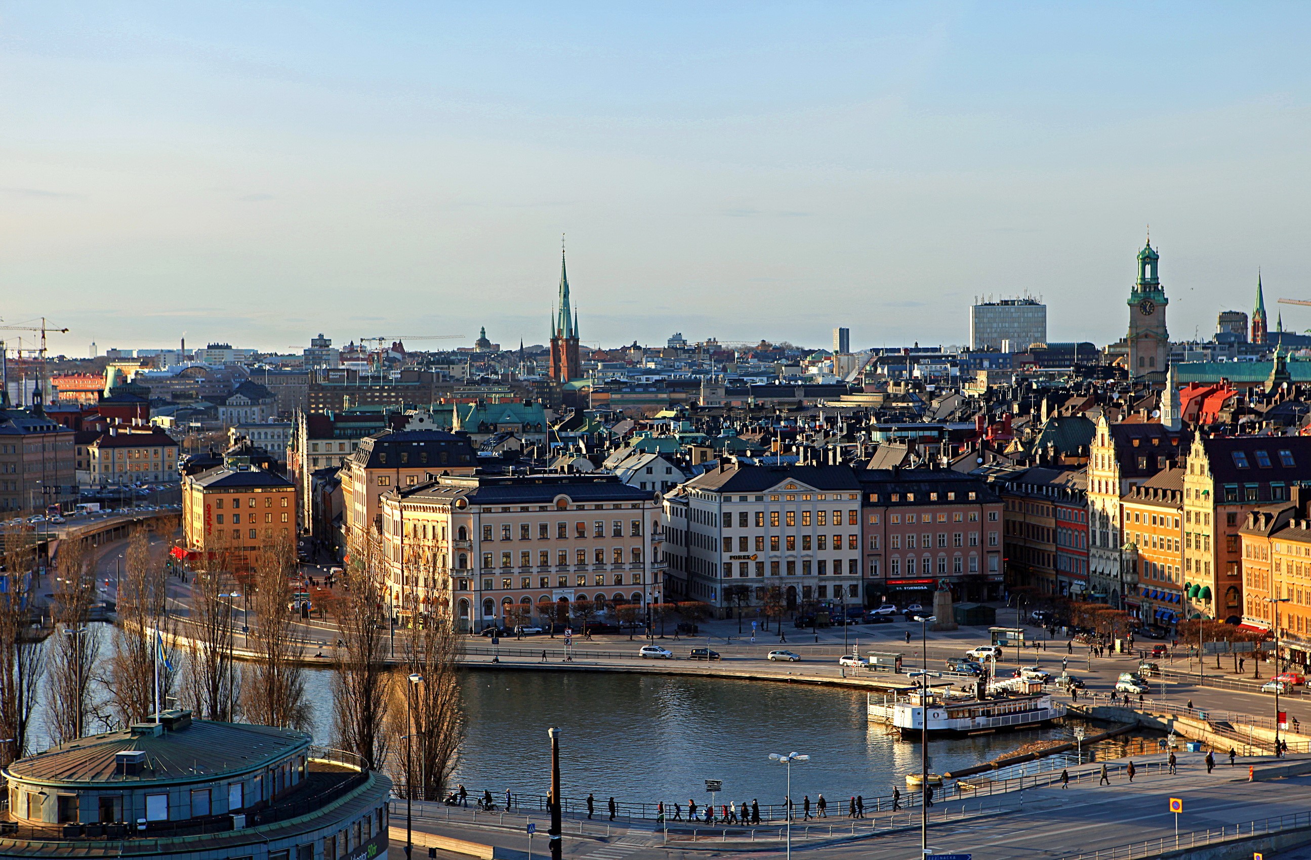 Stockholm cityscape with water and buildings HD Wallpaper