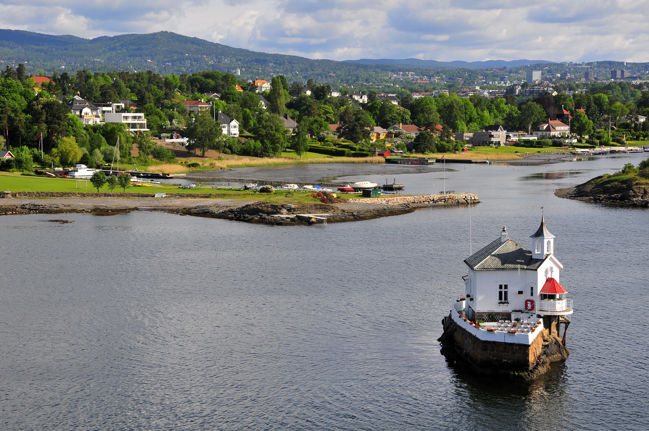 Small white building on a rock in the water, Norway HD Wallpaper