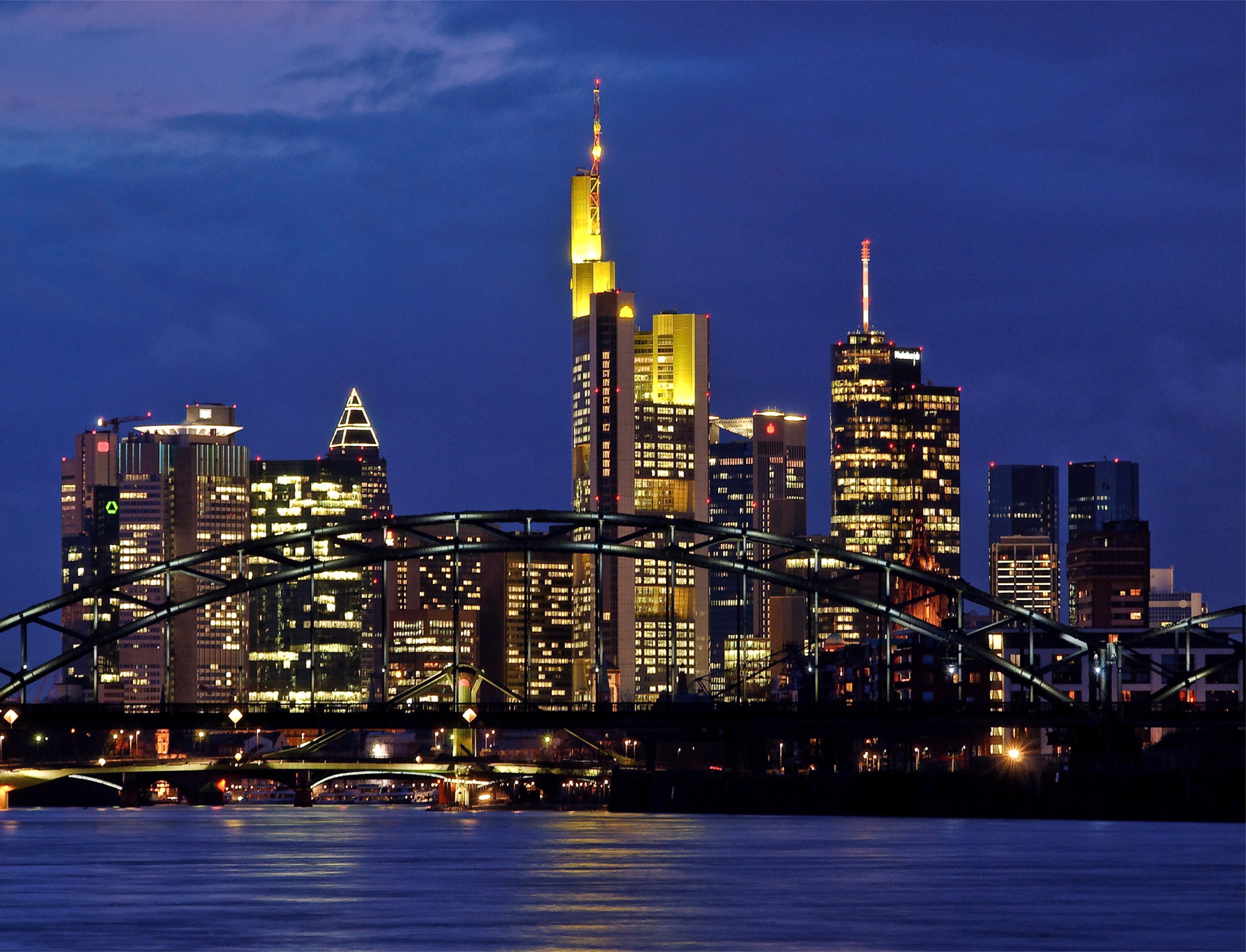 Frankfurt skyline at night with bridge and river HD Wallpaper