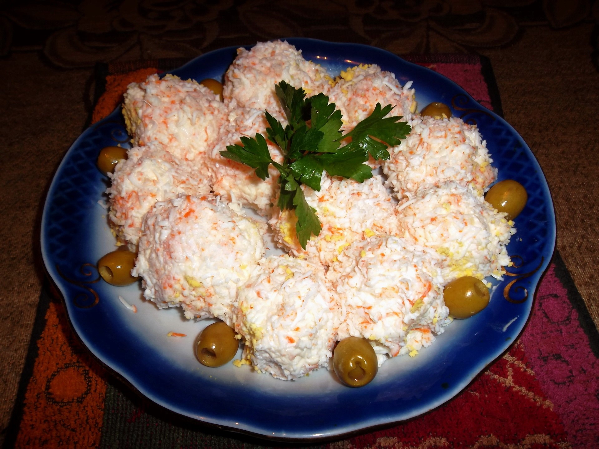 Crab salad balls with olives and parsley HD Wallpaper