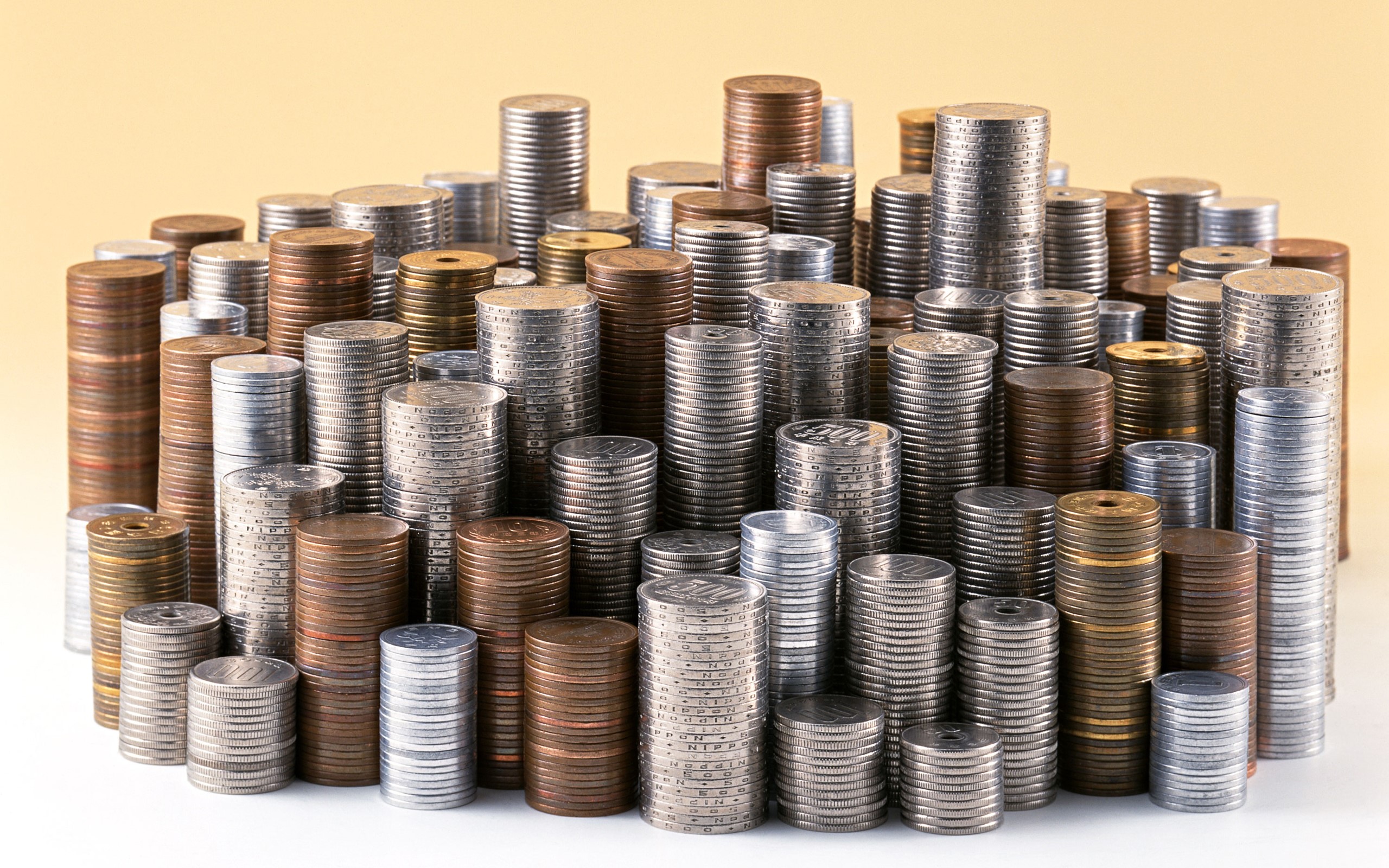 Stacks of coins HD Wallpaper