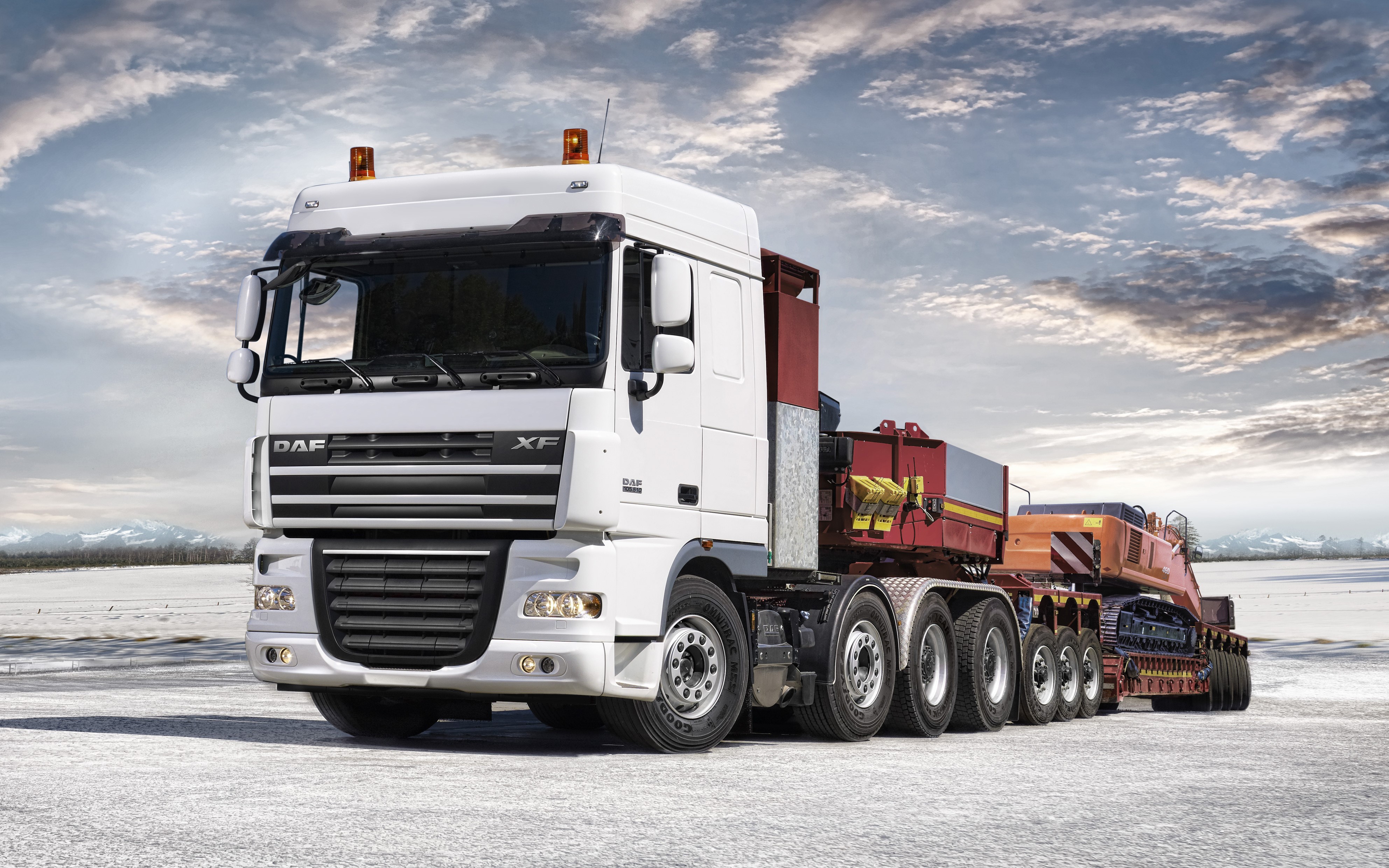 4K DAF Trucks with Heavy Equipment Trailer HD Wallpaper