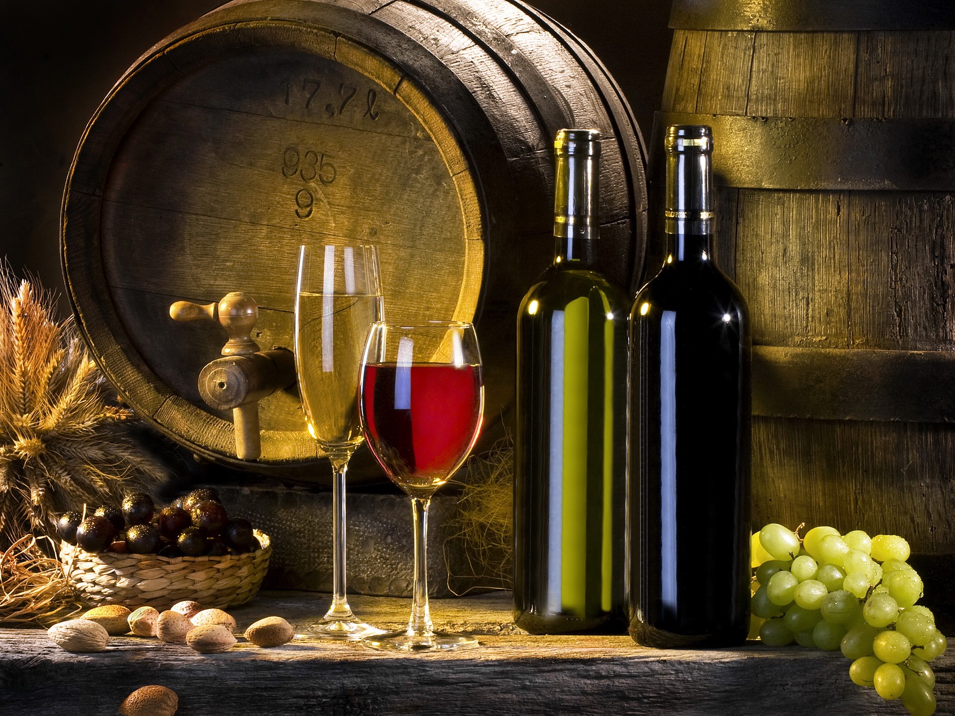 Wine bottles, glasses, grapes, nuts, and barrels HD Wallpaper