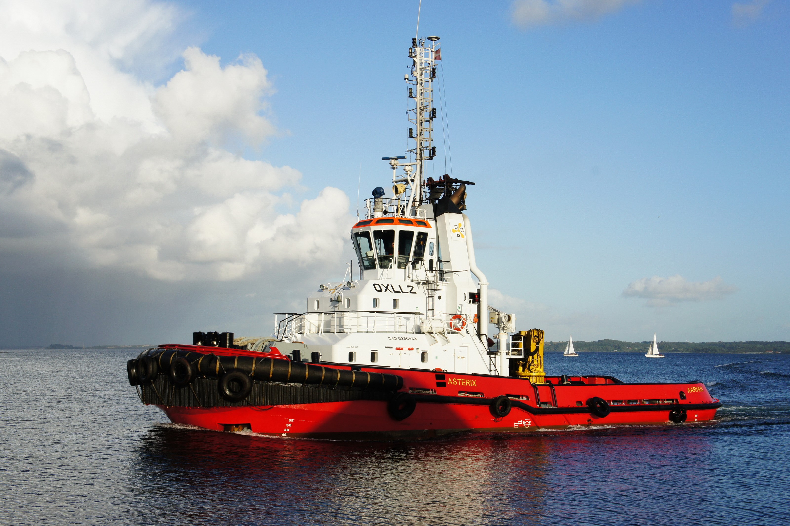 Red and white tugboat 'Asterix' sailing on the water HD Wallpaper