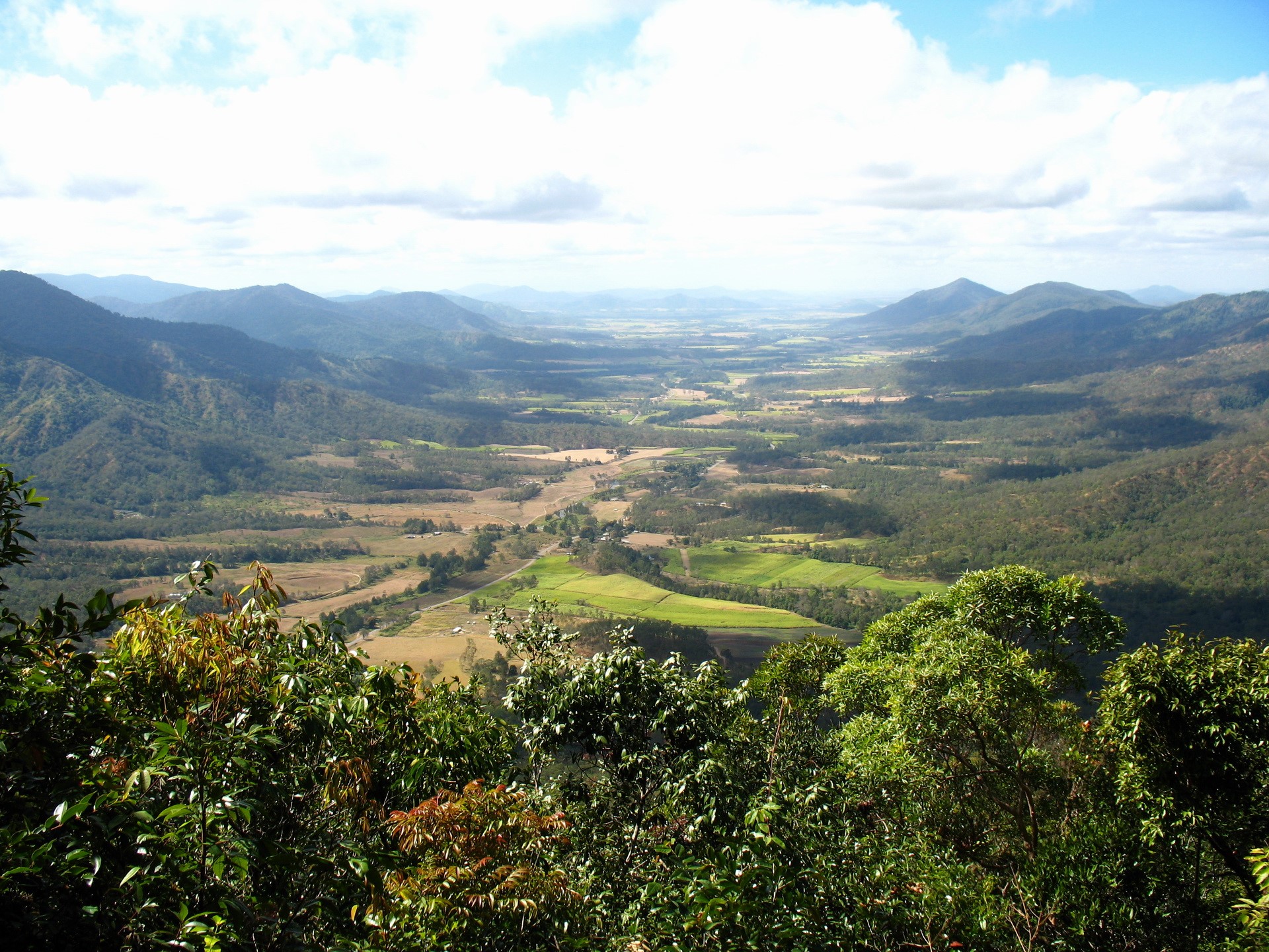 Scenic valley view from a hilltop park HD Wallpaper