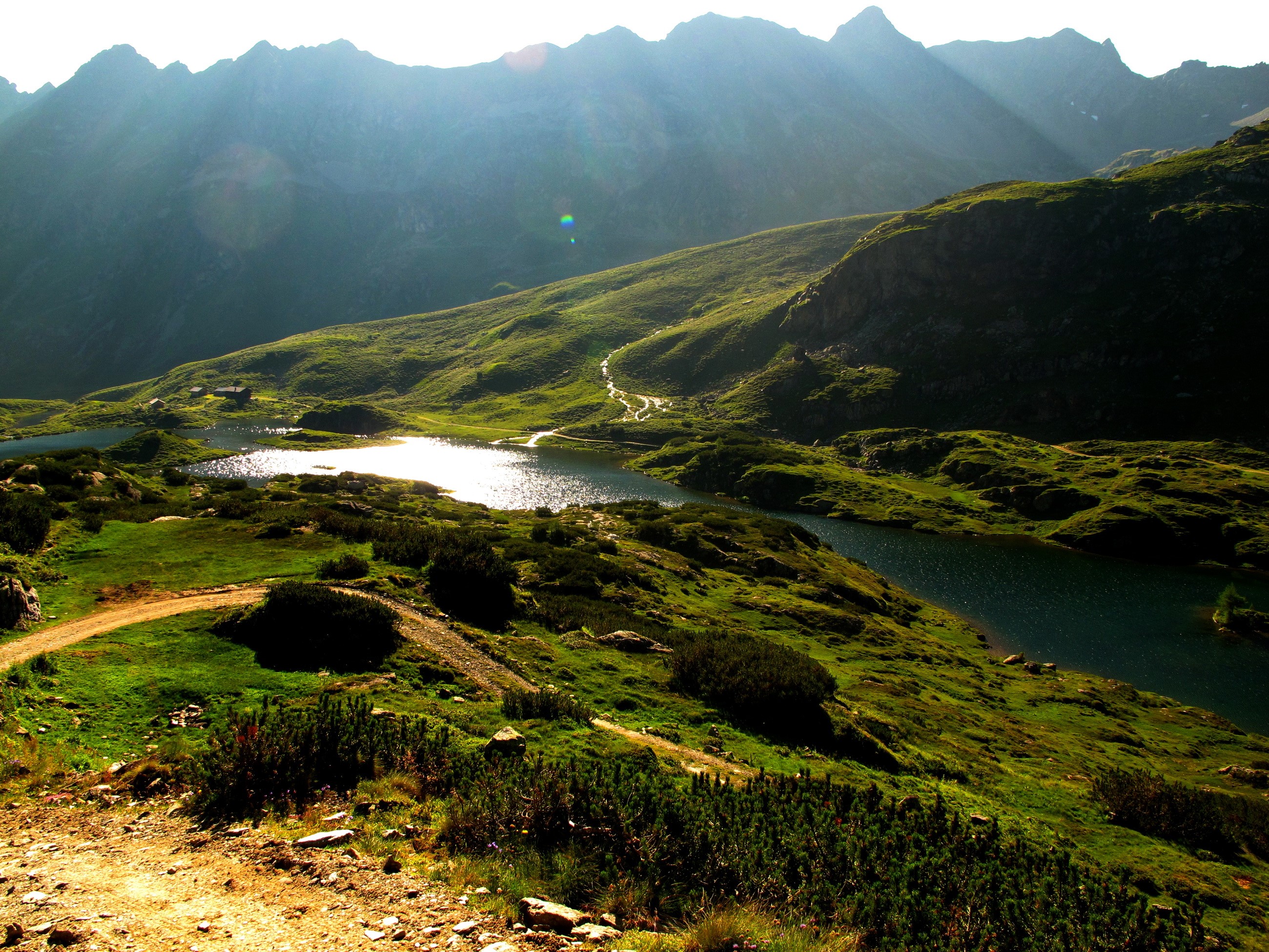 Mountain landscape with lakes and hiking trail HD Wallpaper