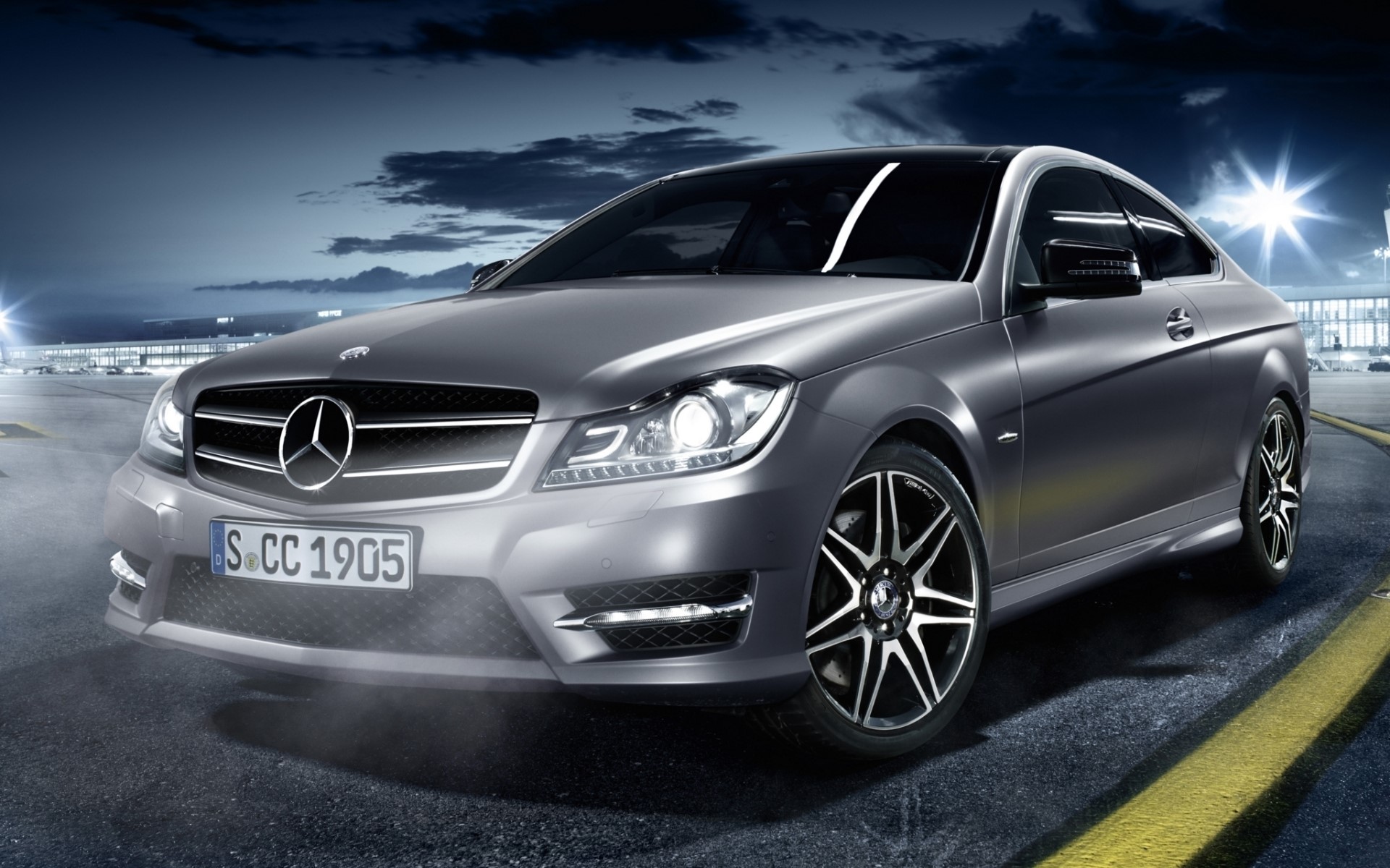 Silver Mercedes-Benz C-Class Coupe on Airport Tarmac HD Wallpaper