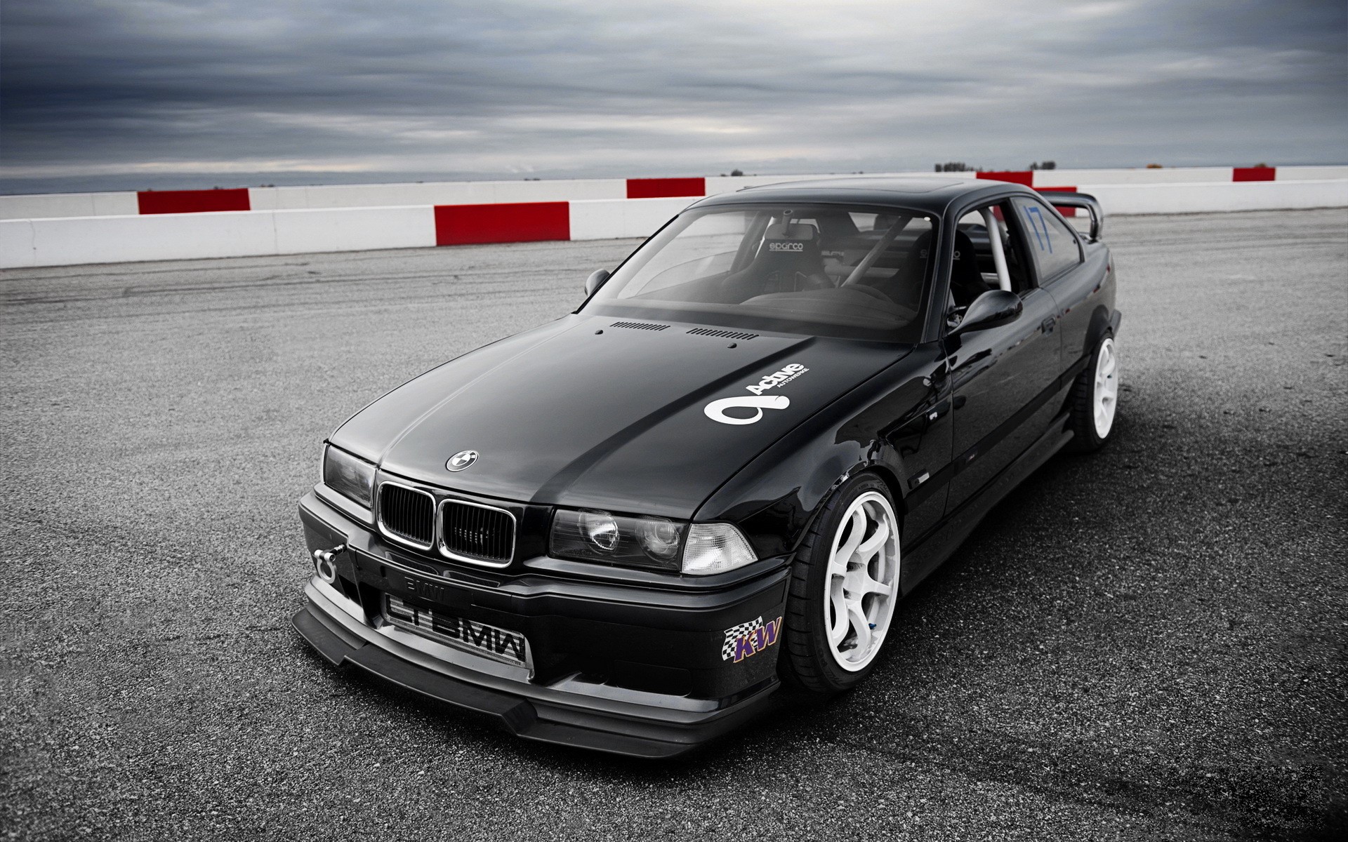 Black BMW M3 E36 on a Race Track HD Wallpaper