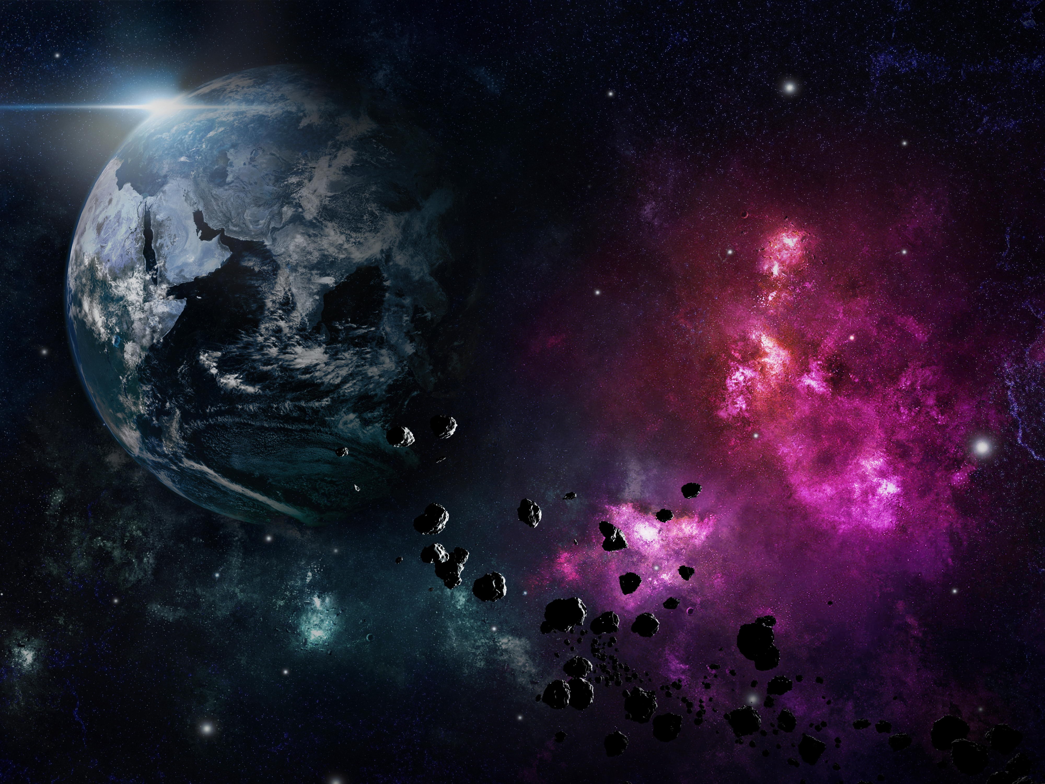 4K Earth with Asteroids and Nebula HD Wallpaper