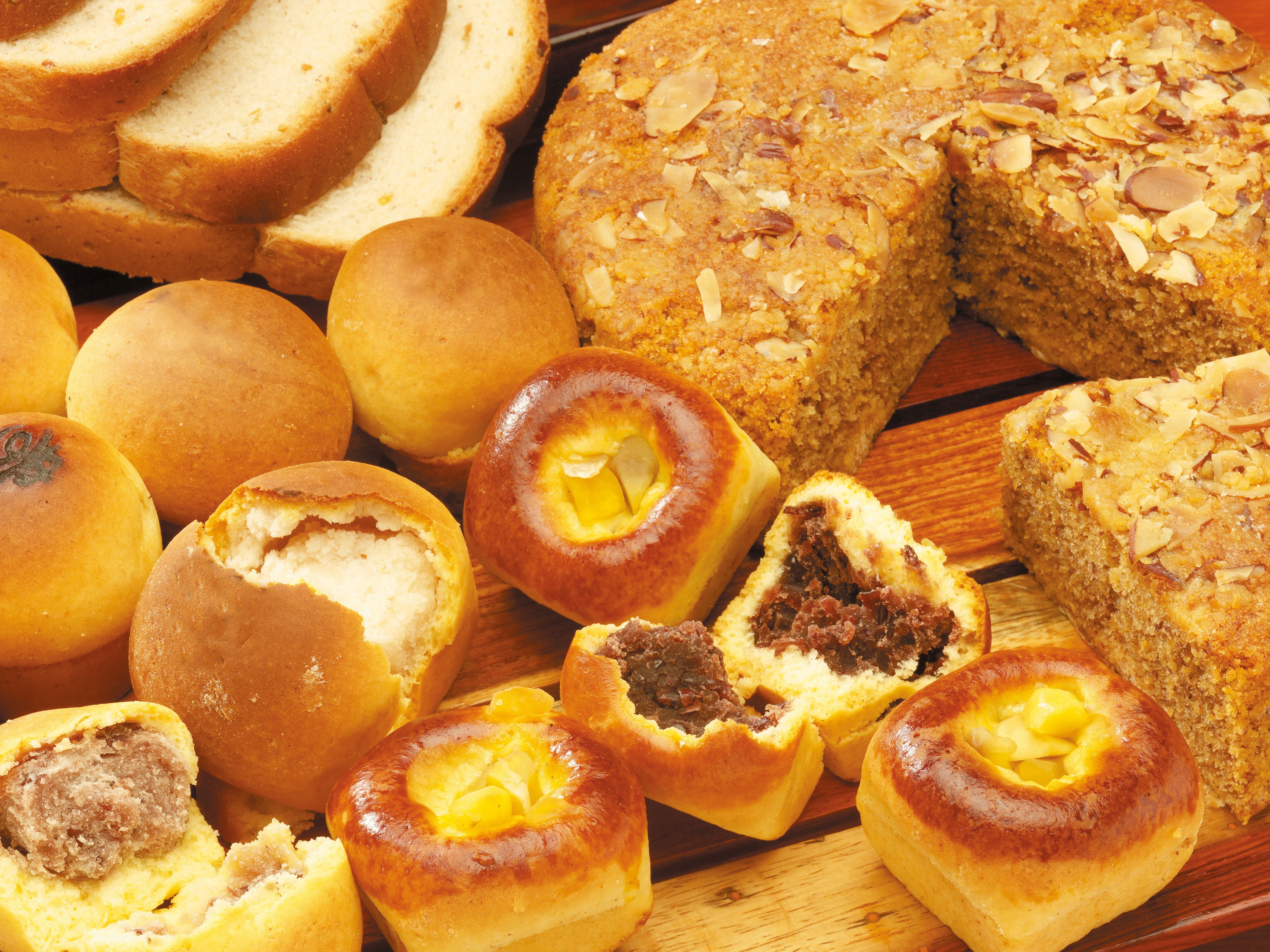 Assortment of Pastries and Bread Slices HD Wallpaper