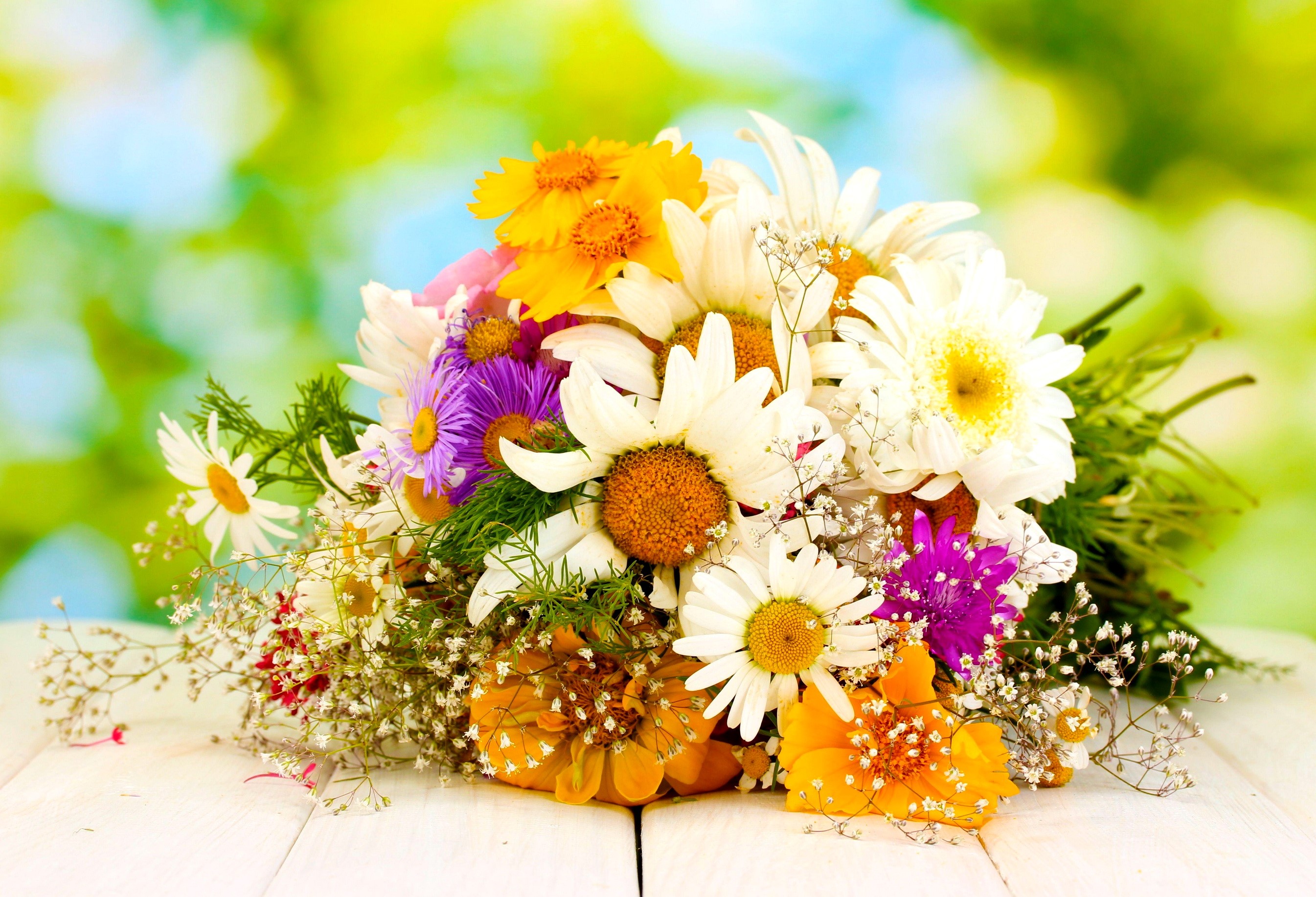 Bouquet of wildflowers on a wooden table HD Wallpaper