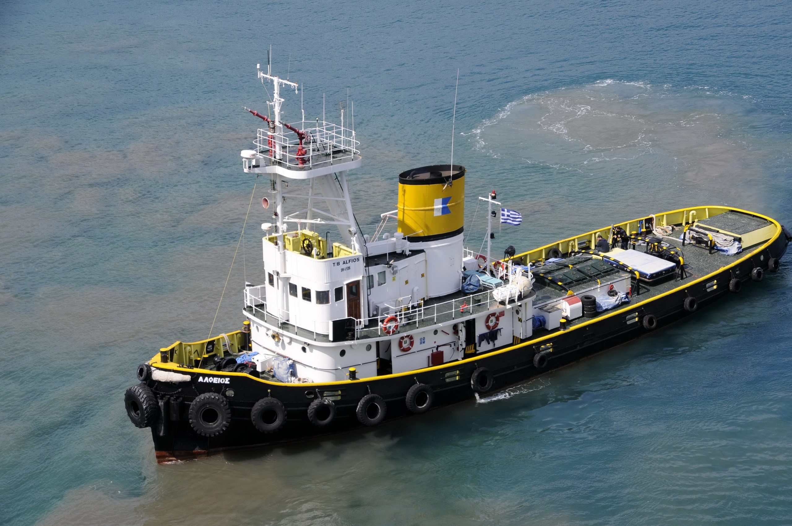 Tugboat "T/B ALFIOS" sailing on the water HD Wallpaper
