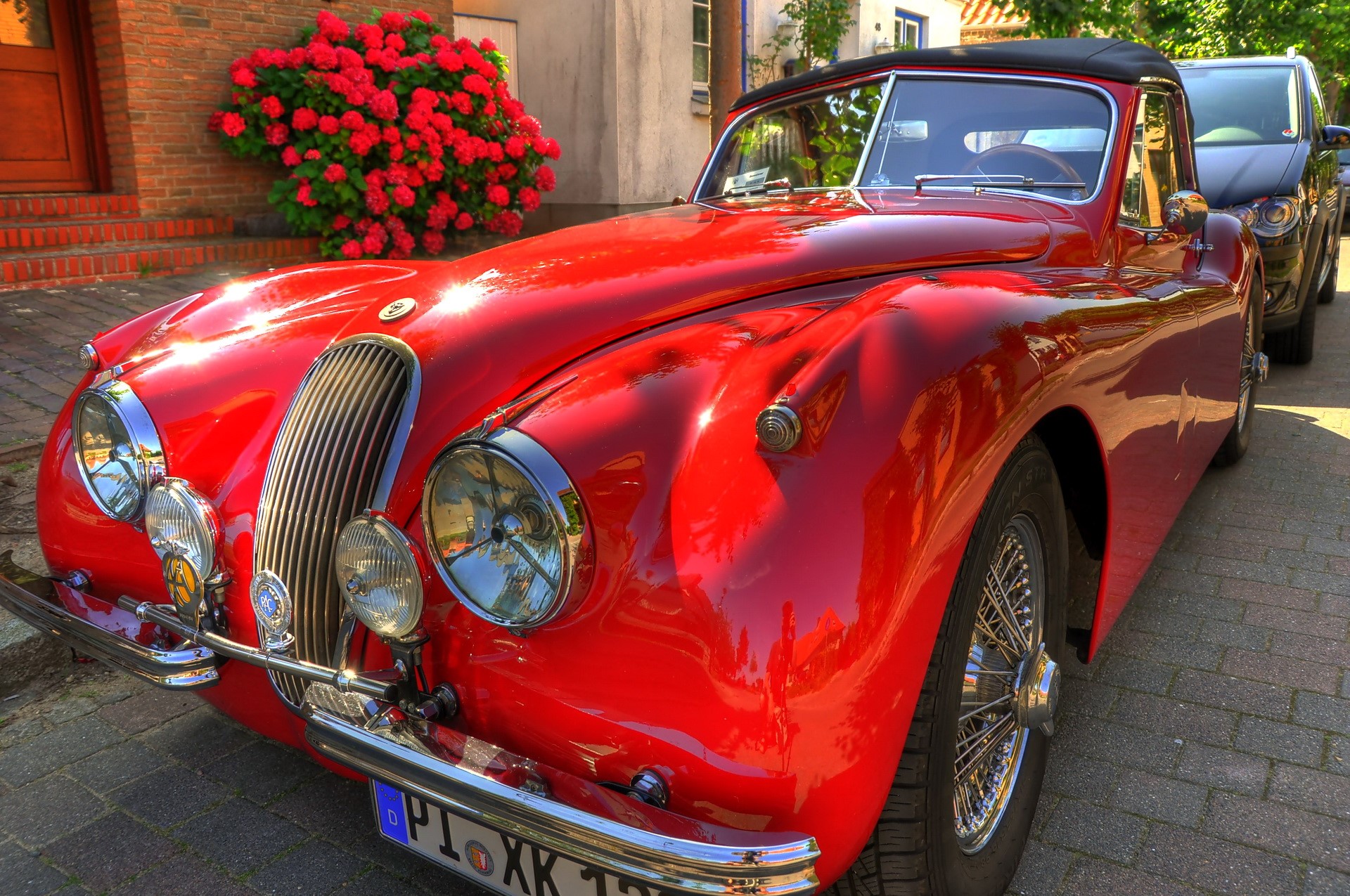 Red Vintage Convertible Car Parked Outdoors HD Wallpaper