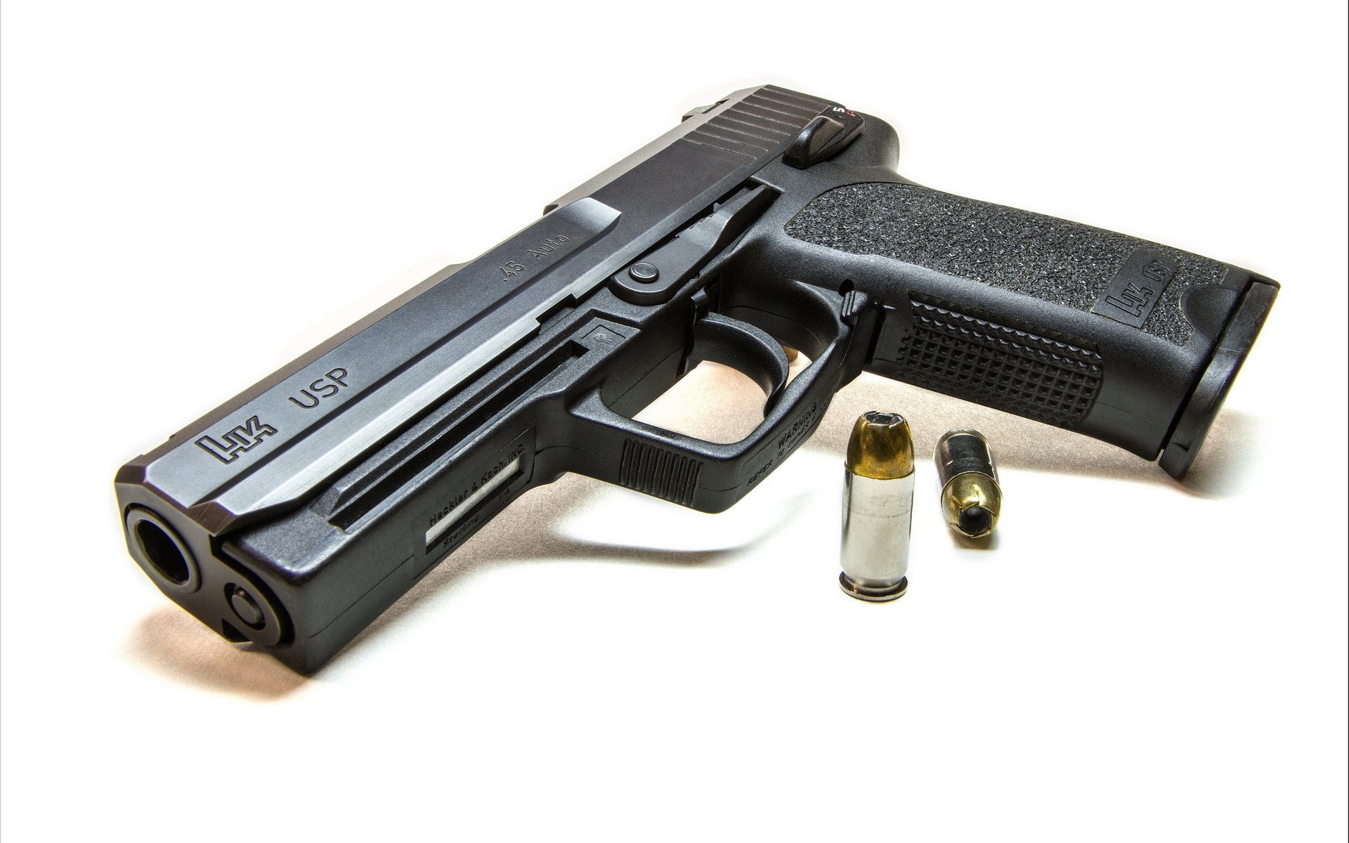 Heckler & Koch USP 45 Auto pistol with ammunition HD Wallpaper