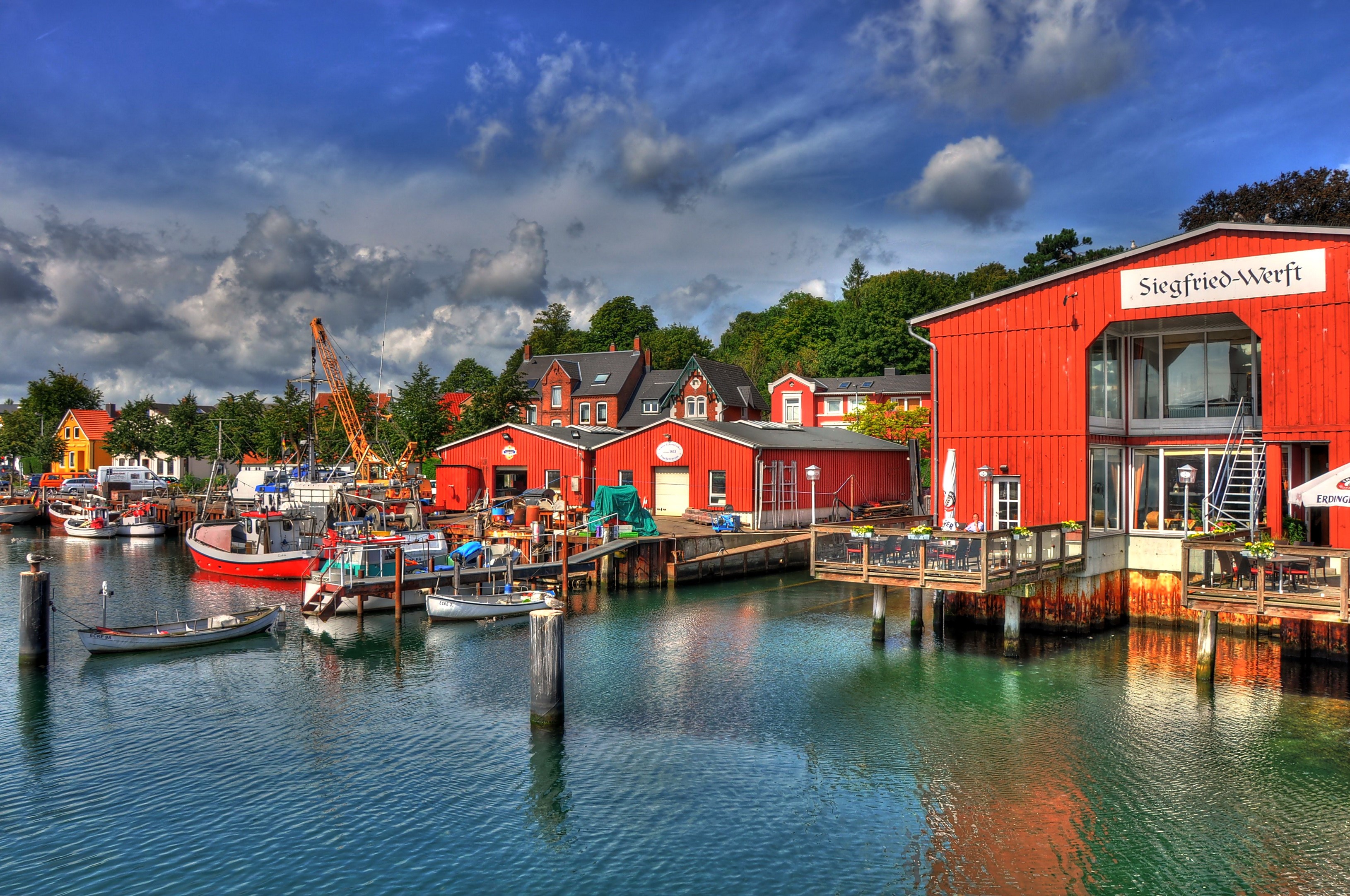Boats docked at Siegfried-Werft harbor HD Wallpaper