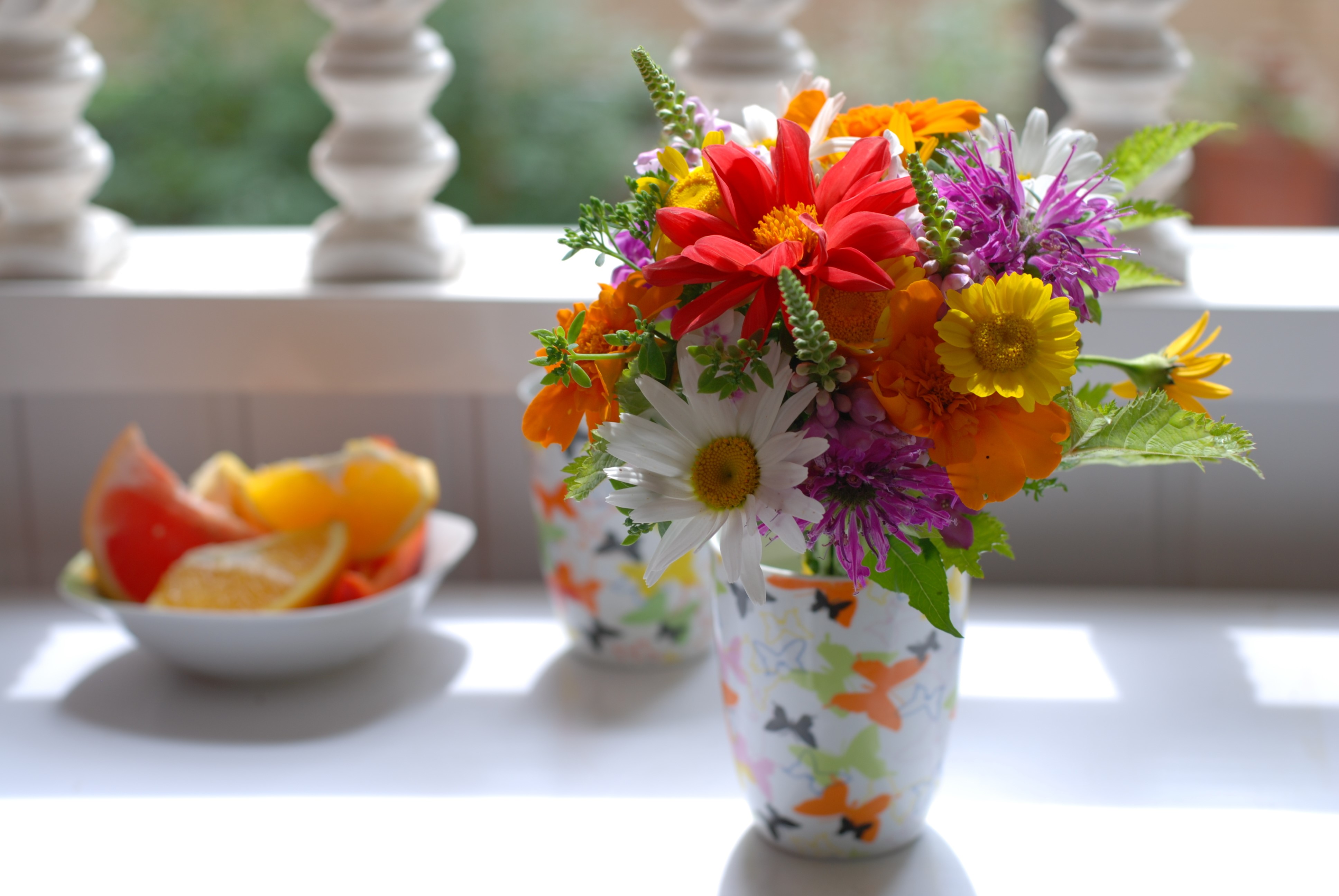 Colorful flower bouquet in a vase with fruit HD Wallpaper