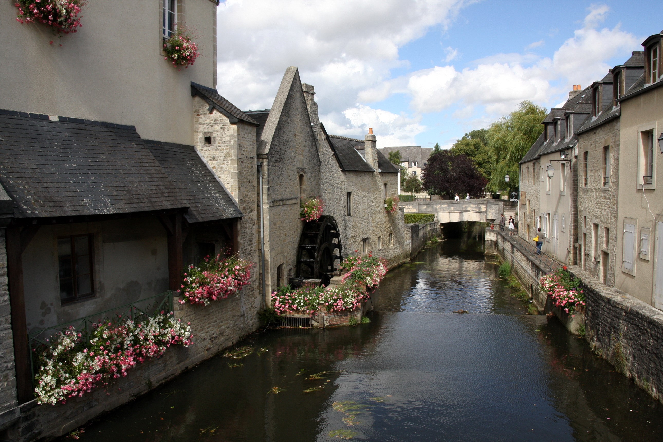 Watermill and canal in a French town HD Wallpaper