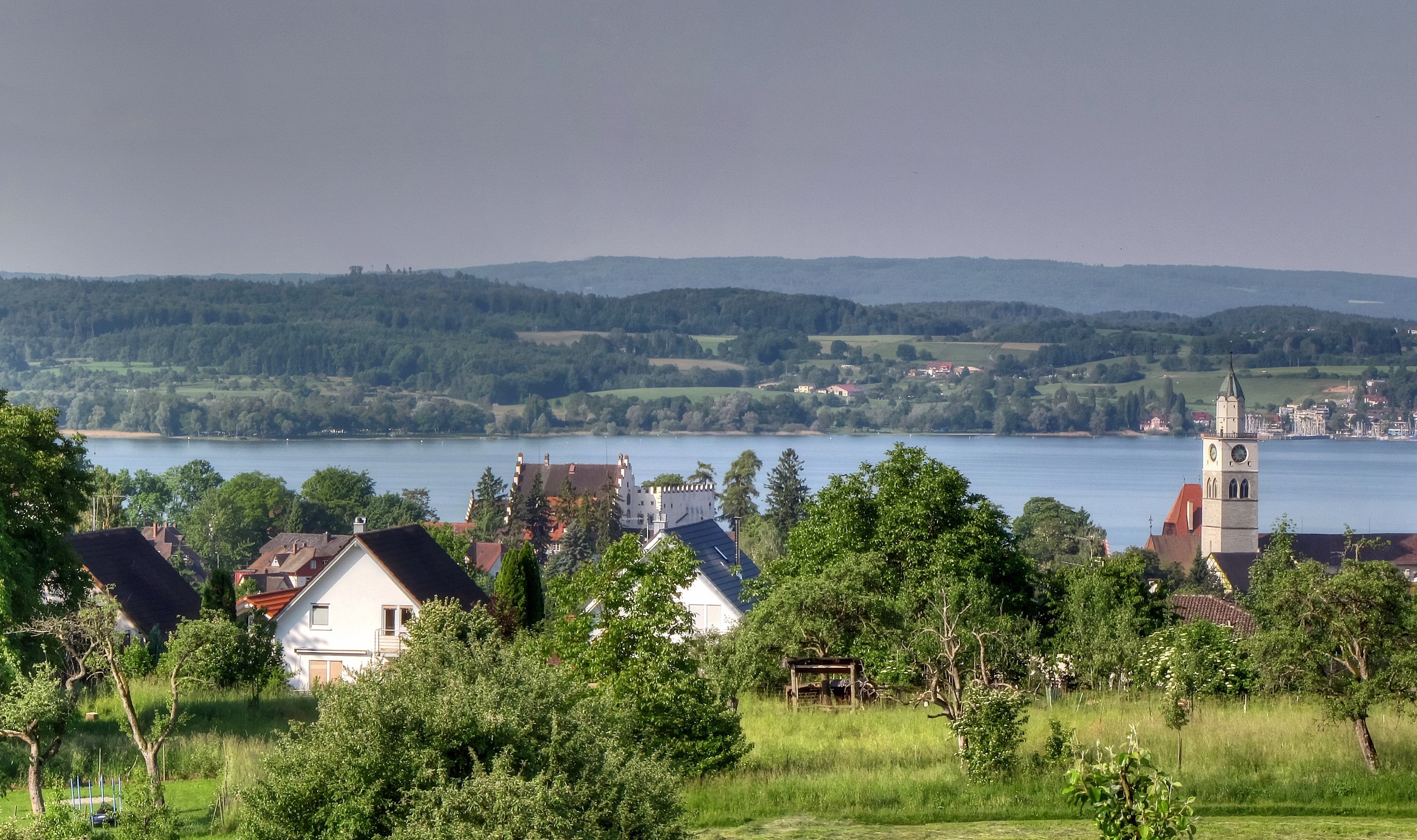 Village with church and lake in Germany HD Wallpaper