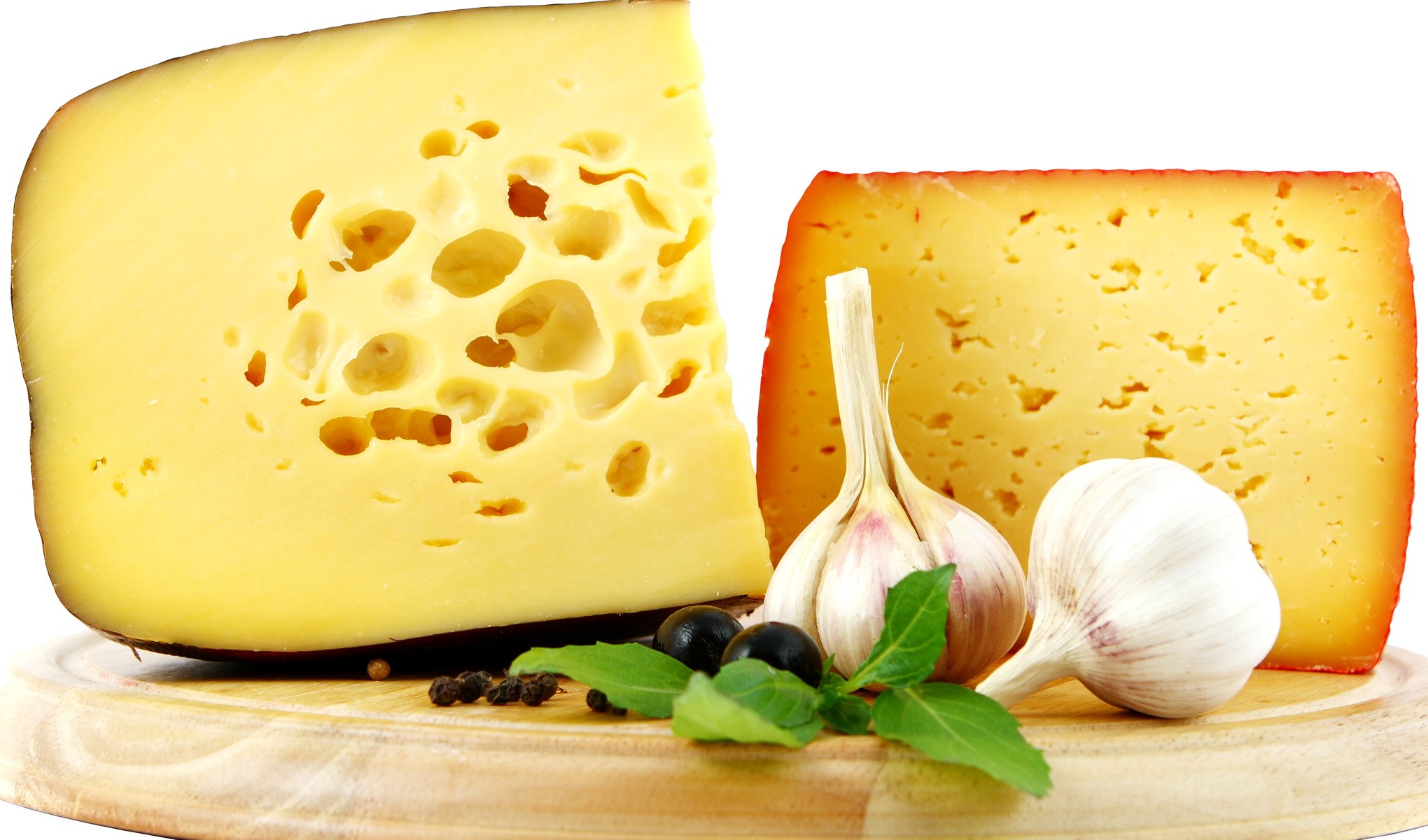 Cheese with garlic and olives on a wooden board HD Wallpaper