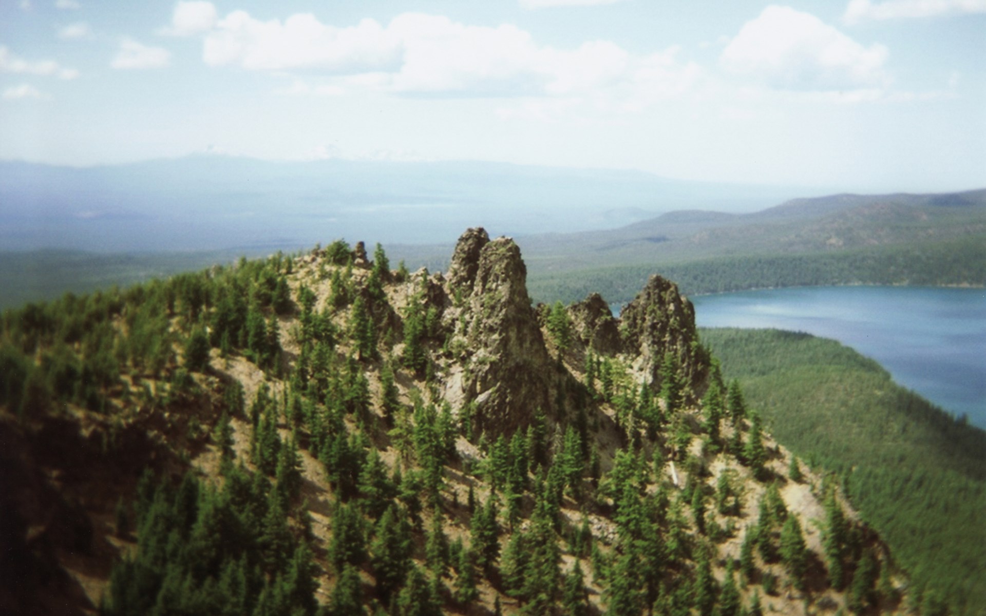 Rocky mountain peak with trees and lake HD Wallpaper