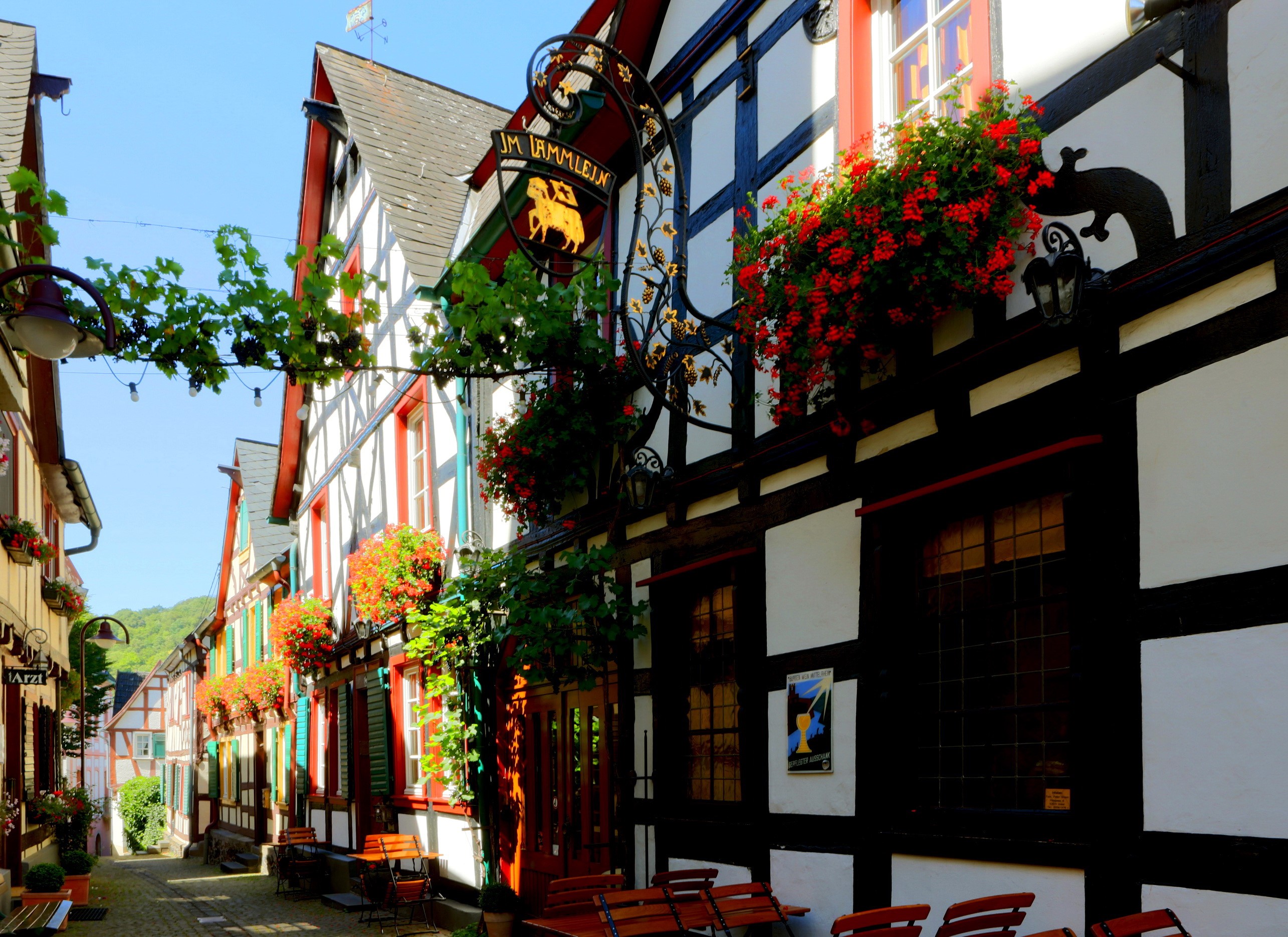 Half-timbered buildings with flowers in Germany HD Wallpaper