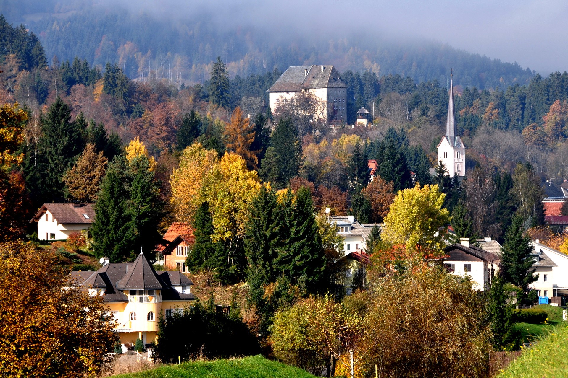 Autumn village with castle and church in Moosburg, Austria HD Wallpaper
