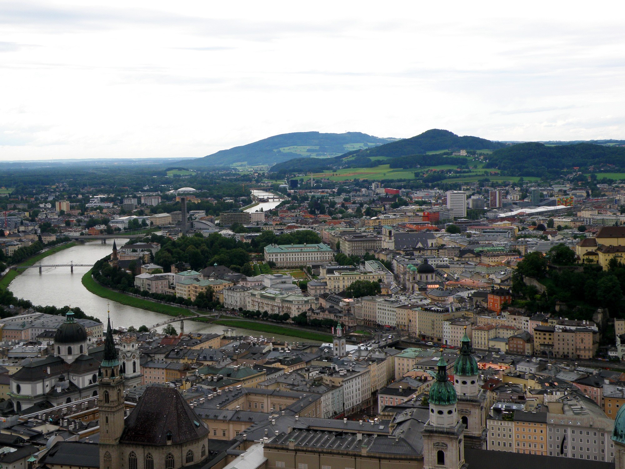Salzburg cityscape with river and mountains, Austria HD Wallpaper