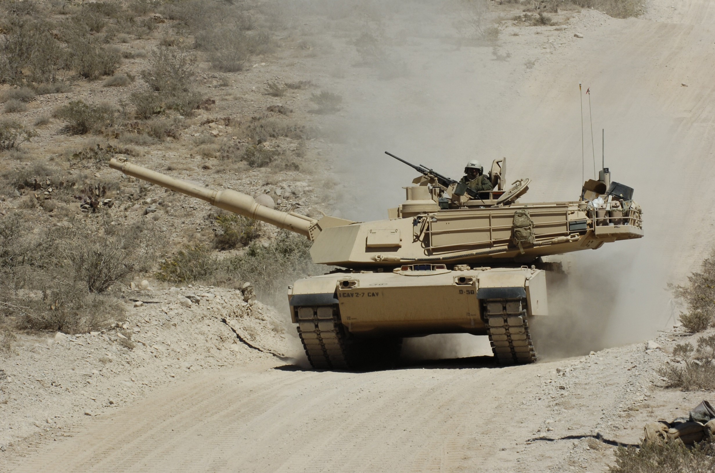 Desert Tank Driving on Dirt Road HD Wallpaper