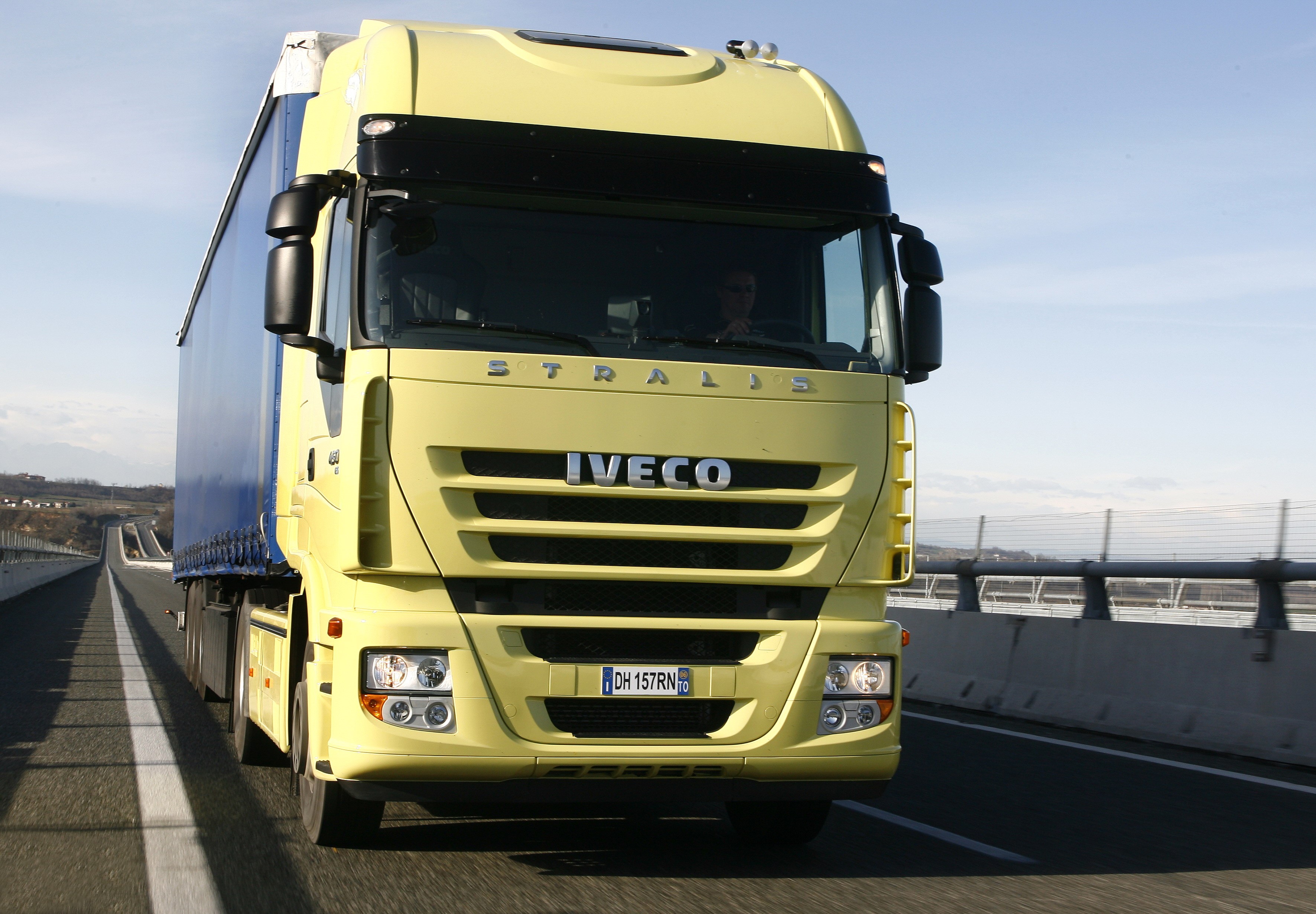 Yellow Iveco Stralis Truck on Highway HD Wallpaper