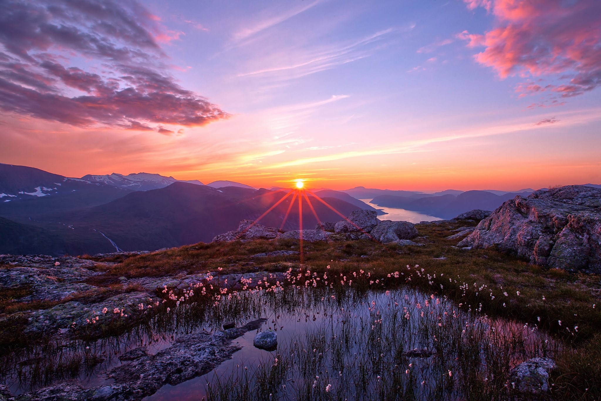 Sunset over mountains and a lake HD Wallpaper