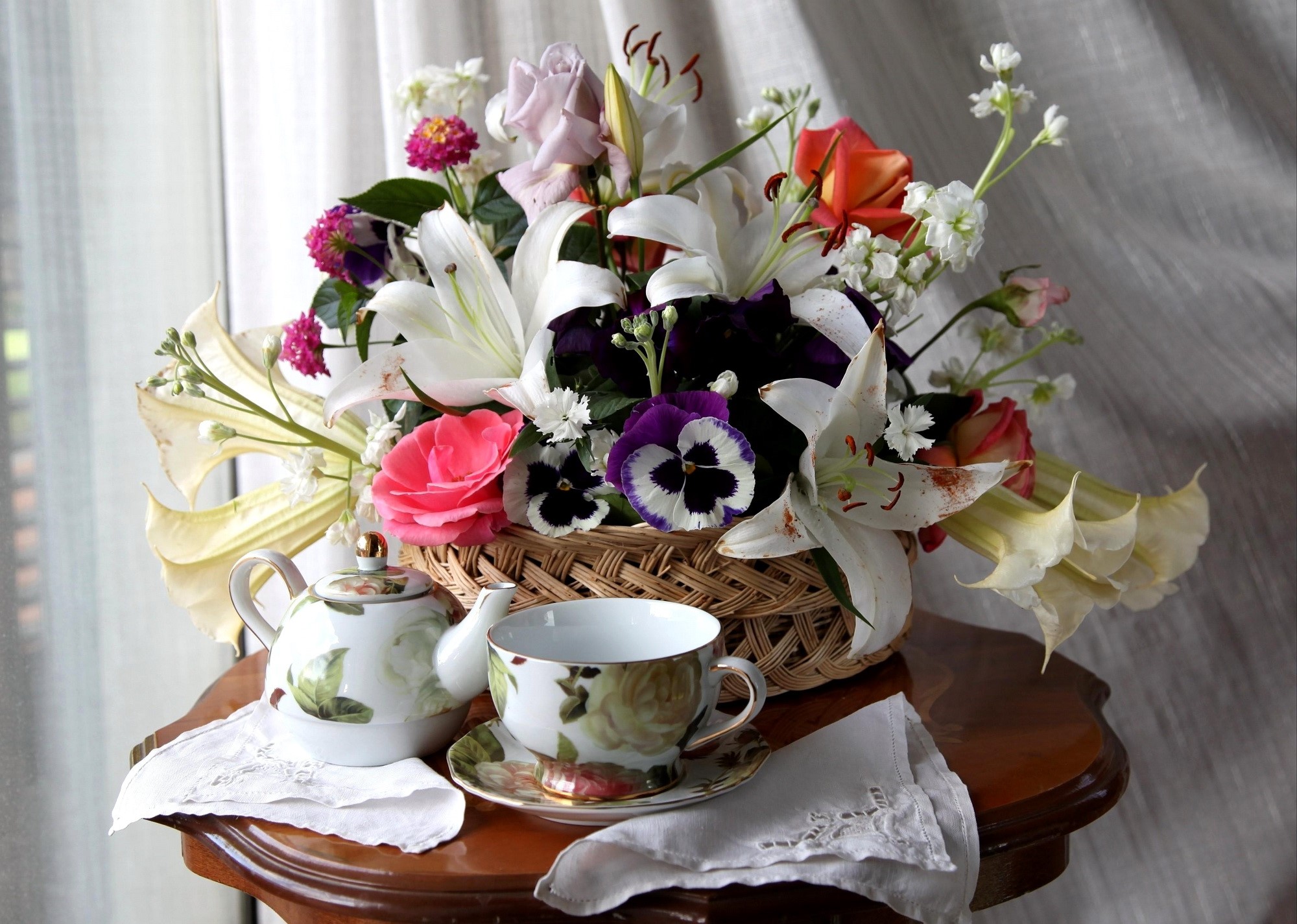 Flower bouquet with tea set on a table HD Wallpaper