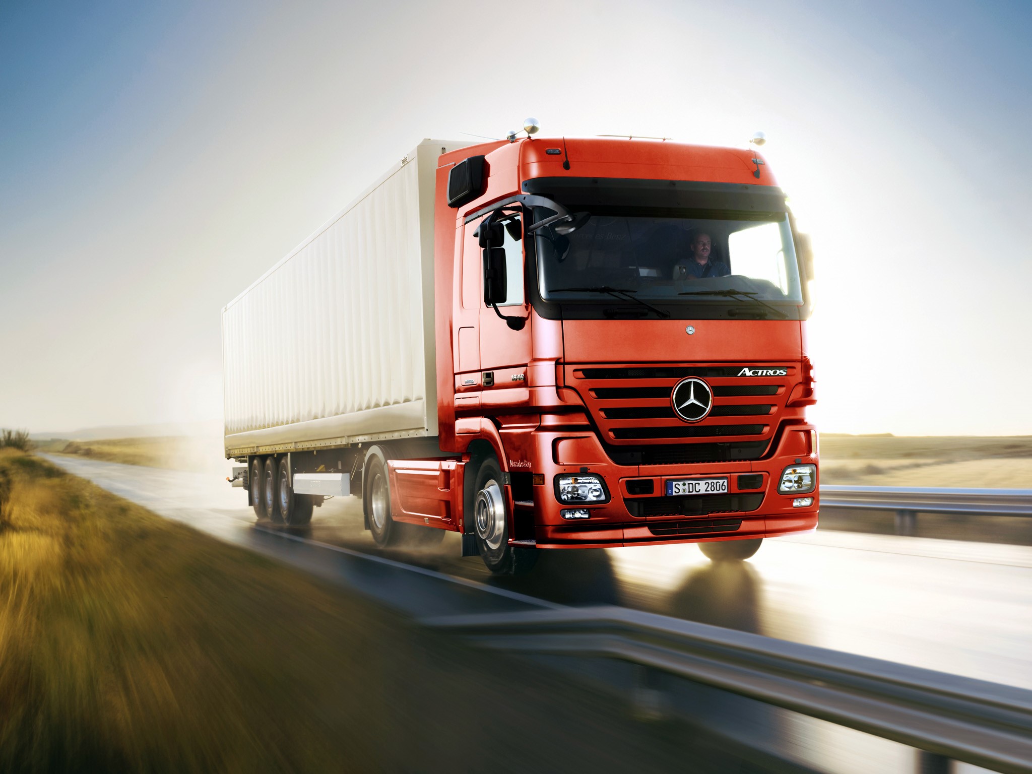 Red Mercedes-Benz Actros Truck on a Highway HD Wallpaper