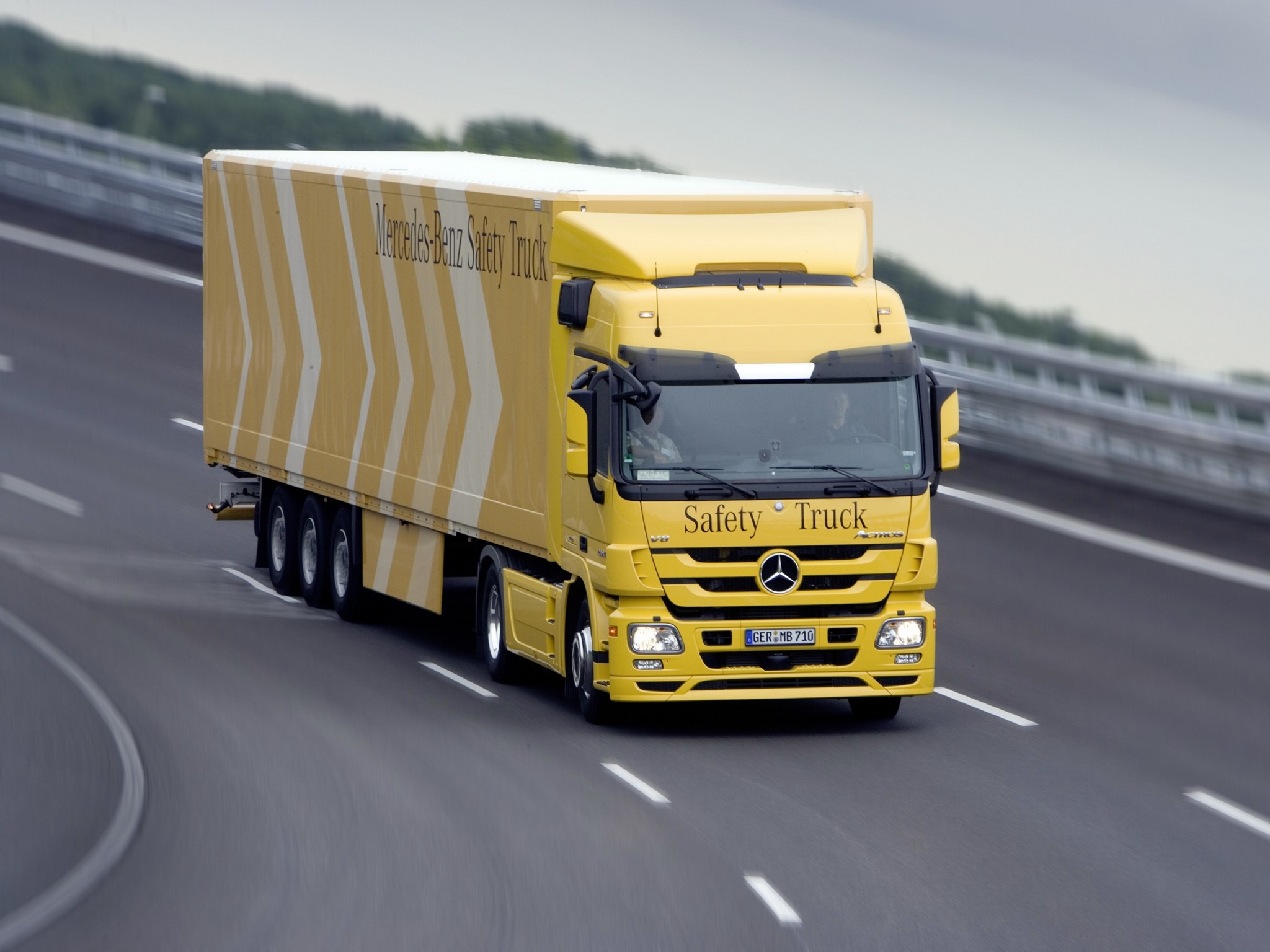 Yellow Mercedes-Benz Safety Truck on Highway HD Wallpaper