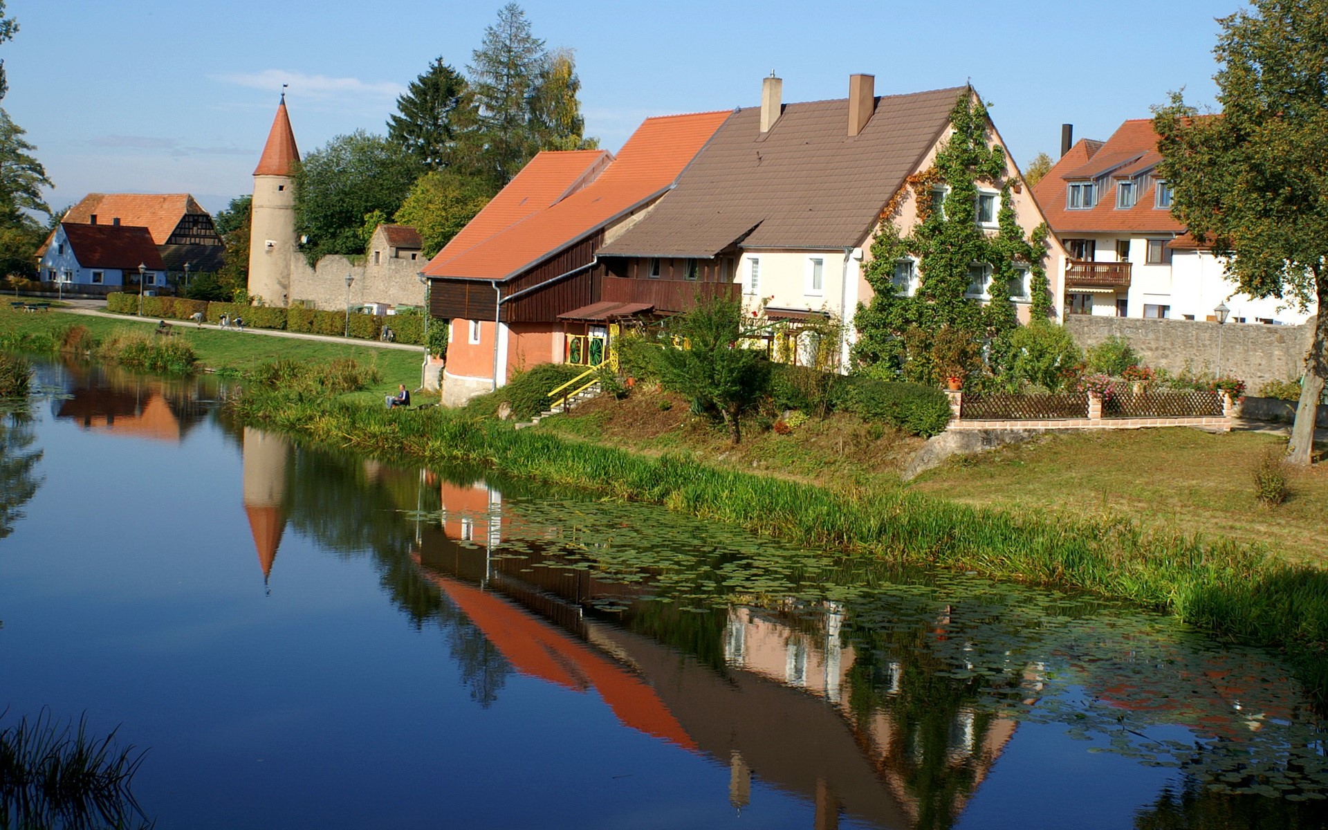 Village with tower and river in Germany HD Wallpaper