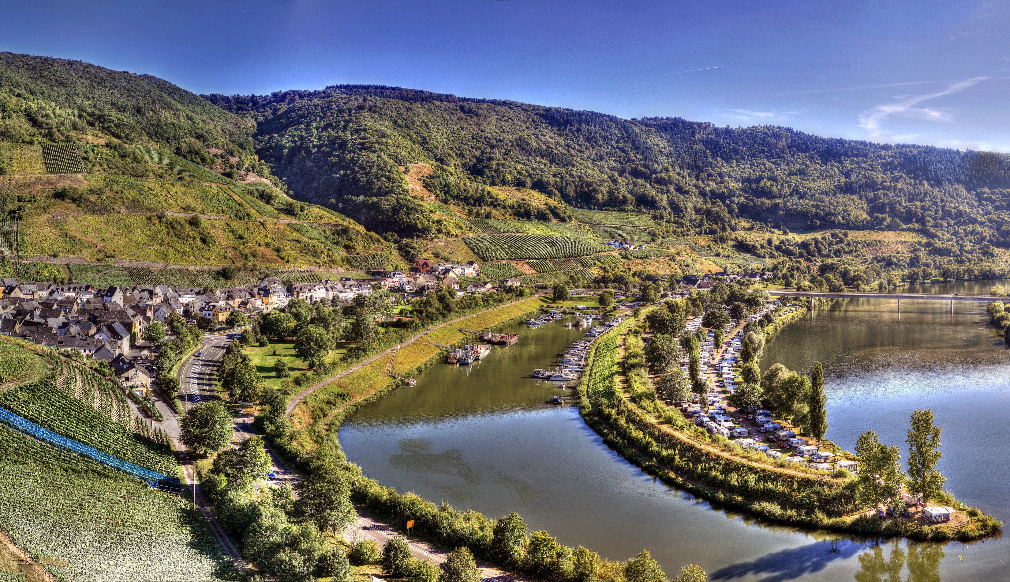 River valley with vineyards and village in Germany HD Wallpaper