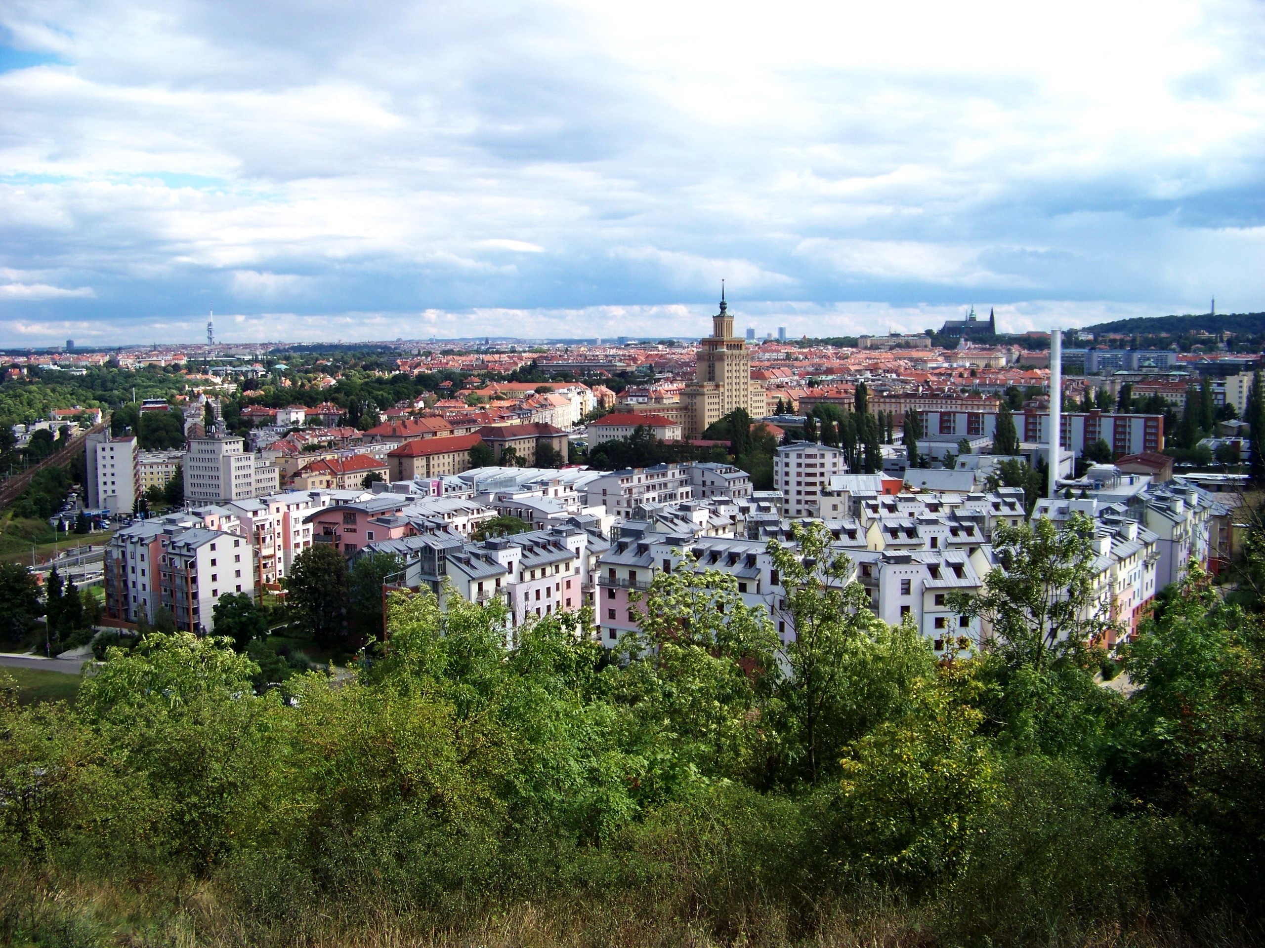 Prague cityscape with buildings and trees HD Wallpaper