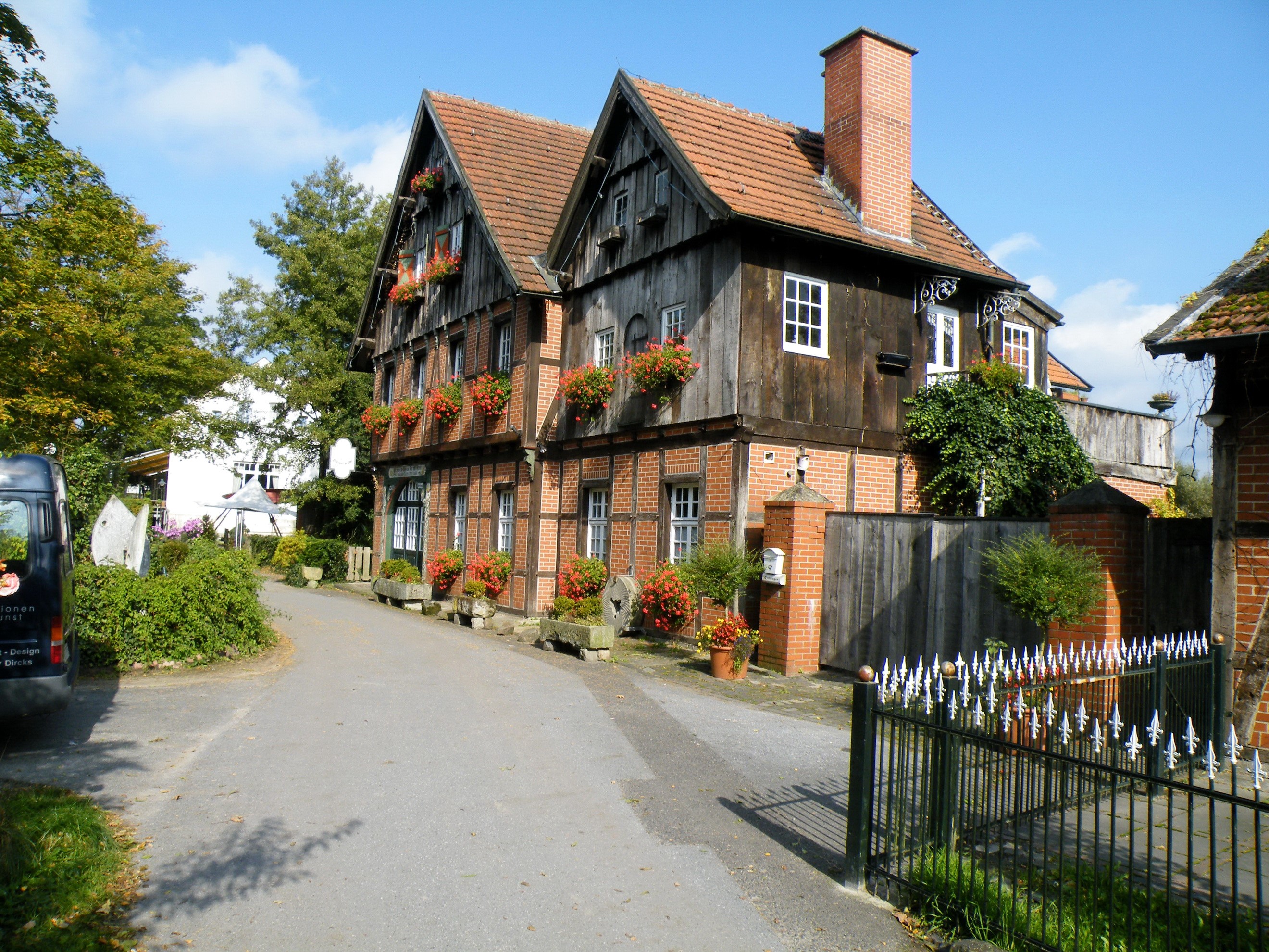 Half-timbered house with flowers in Germany HD Wallpaper