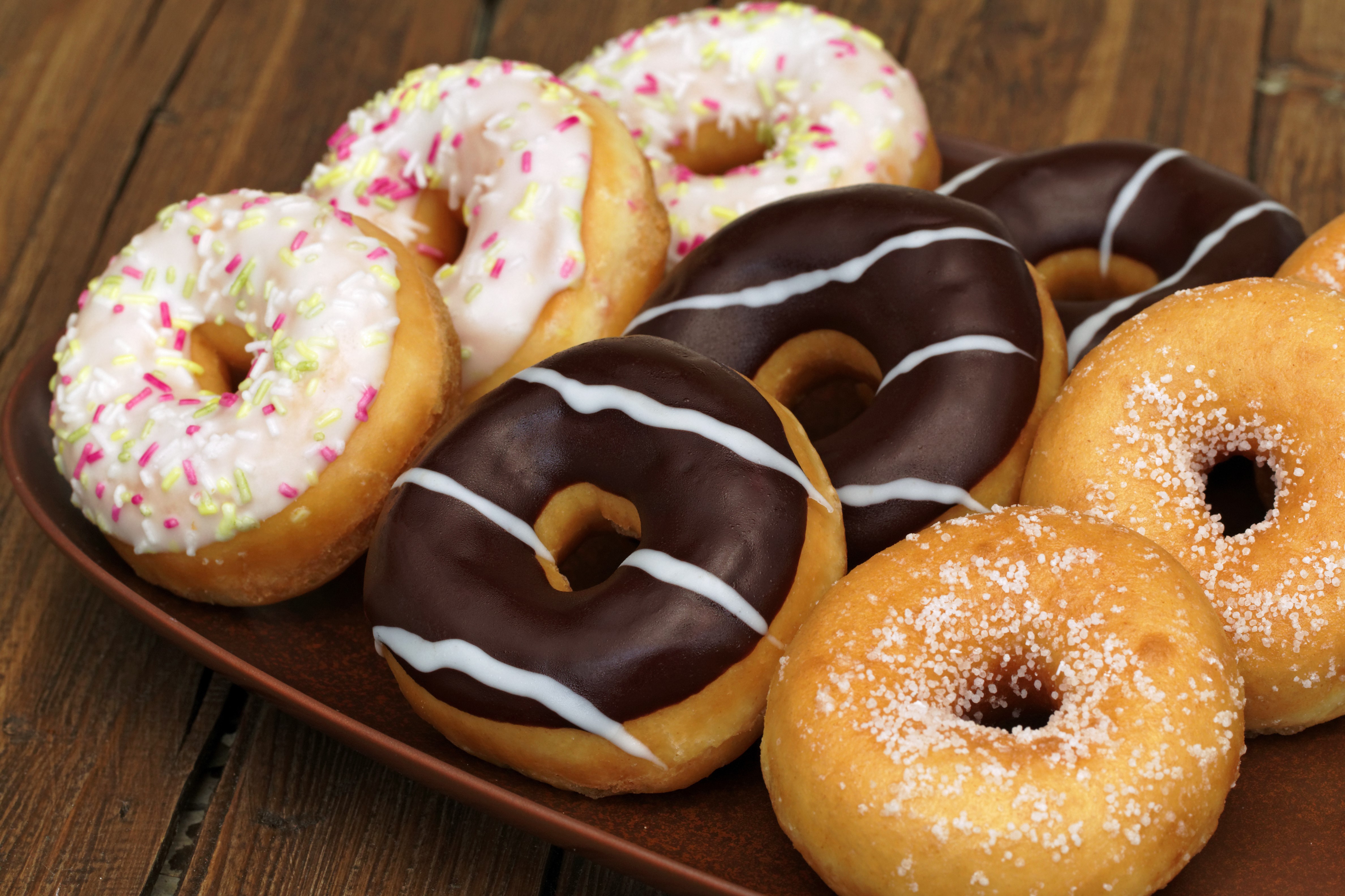 Assorted donuts on a platter HD Wallpaper