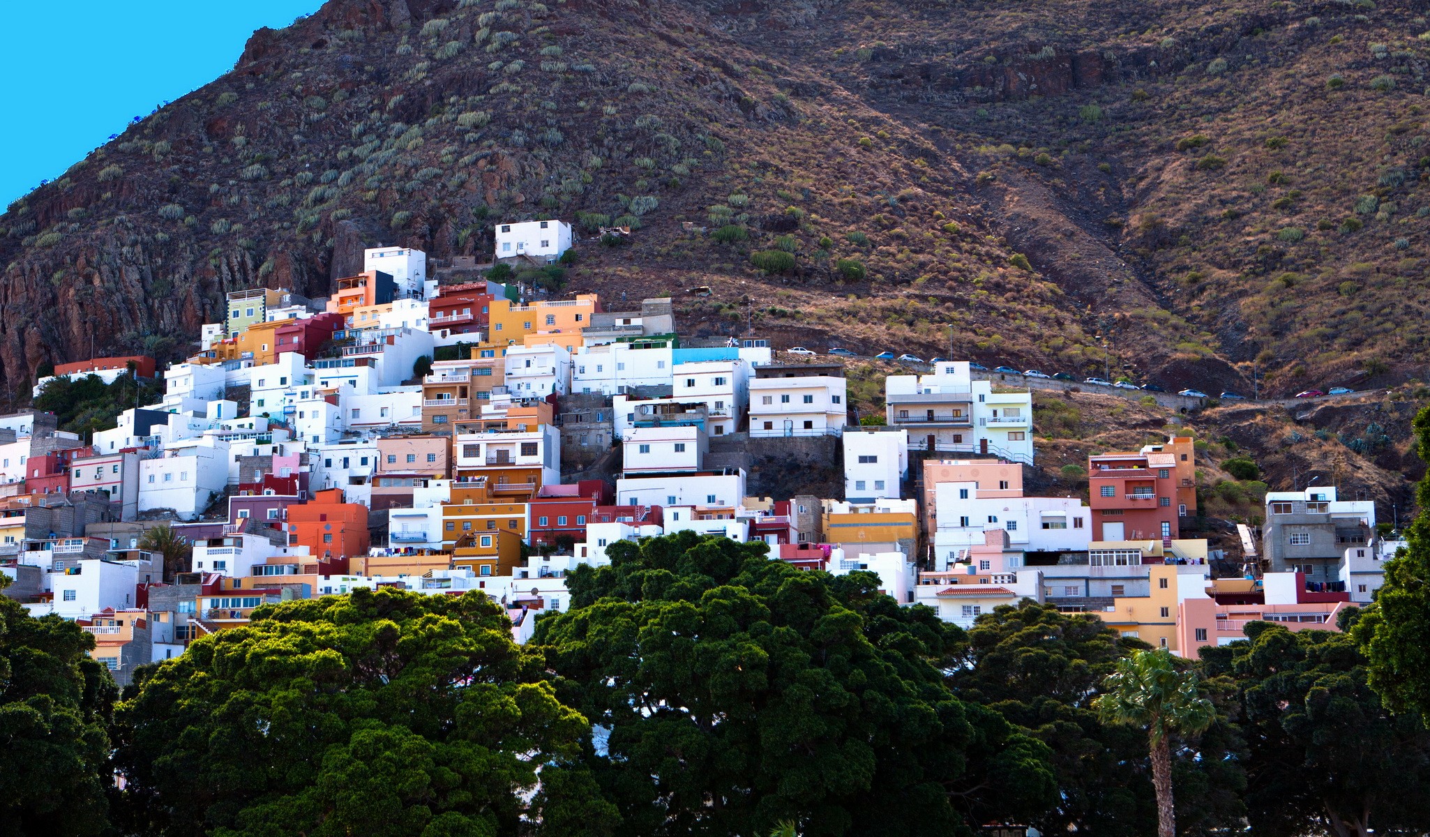Colorful houses on a hillside in the Canary Islands, Spain HD Wallpaper