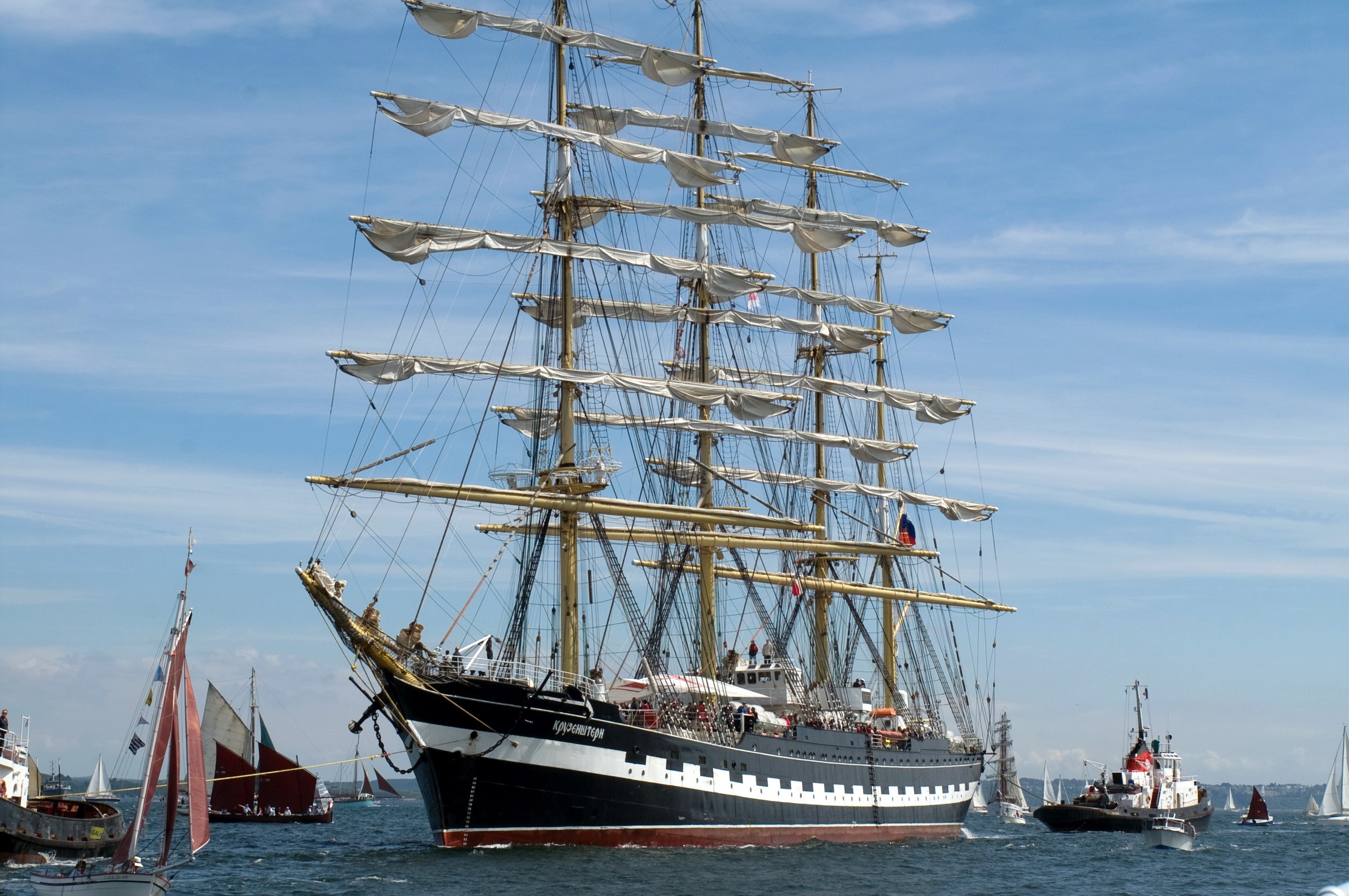 Kruzenstern tall ship sailing with other boats HD Wallpaper