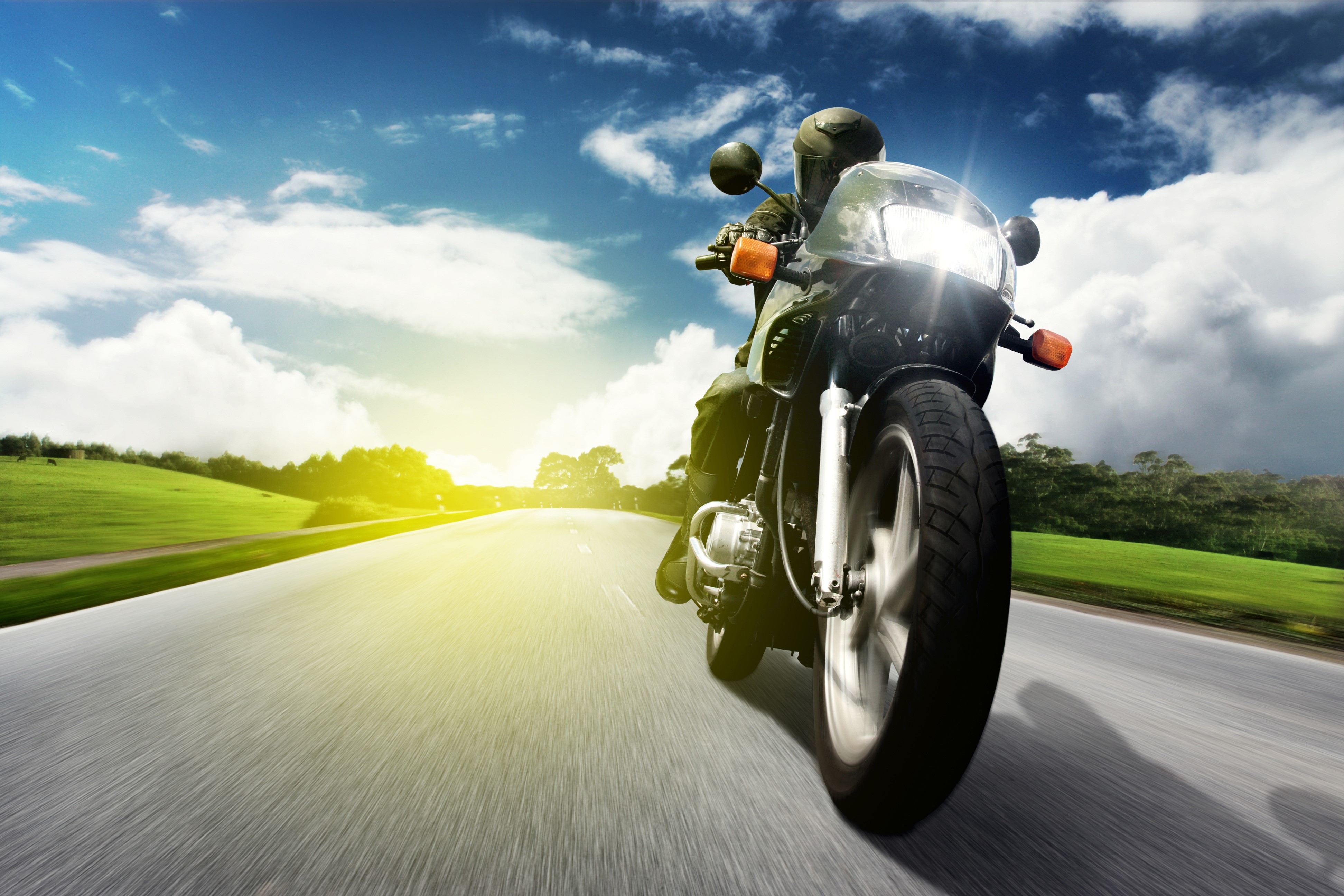 Motorcyclist on a Road HD Wallpaper