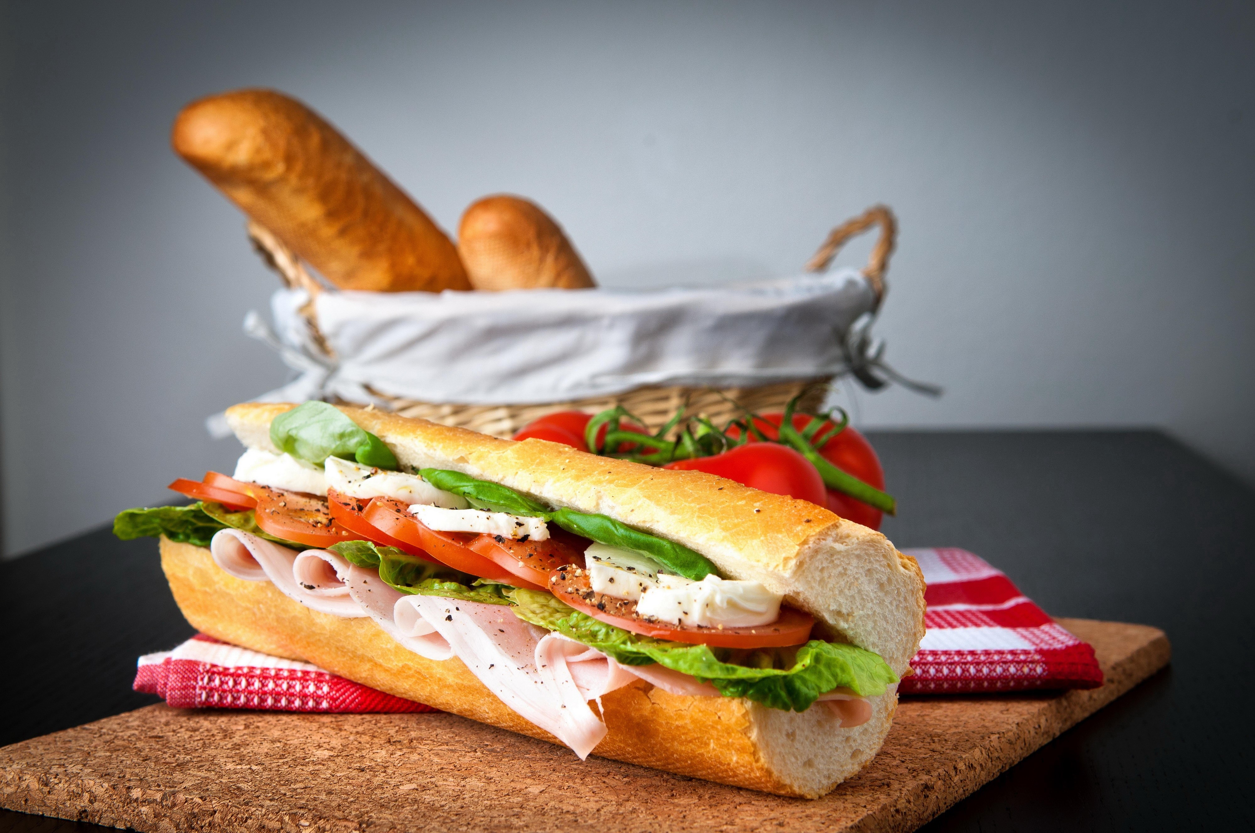 Sandwich with ham, cheese, tomatoes, lettuce, and basil HD Wallpaper