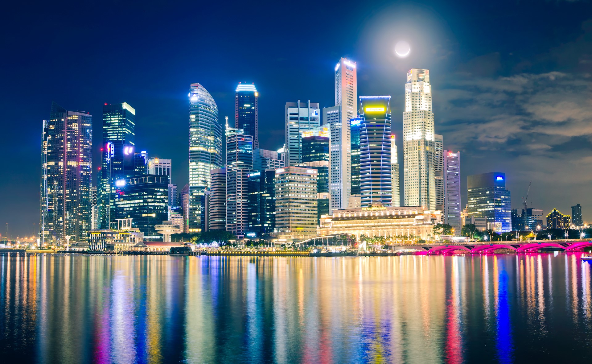 Singapore skyline at night with moon reflection HD Wallpaper