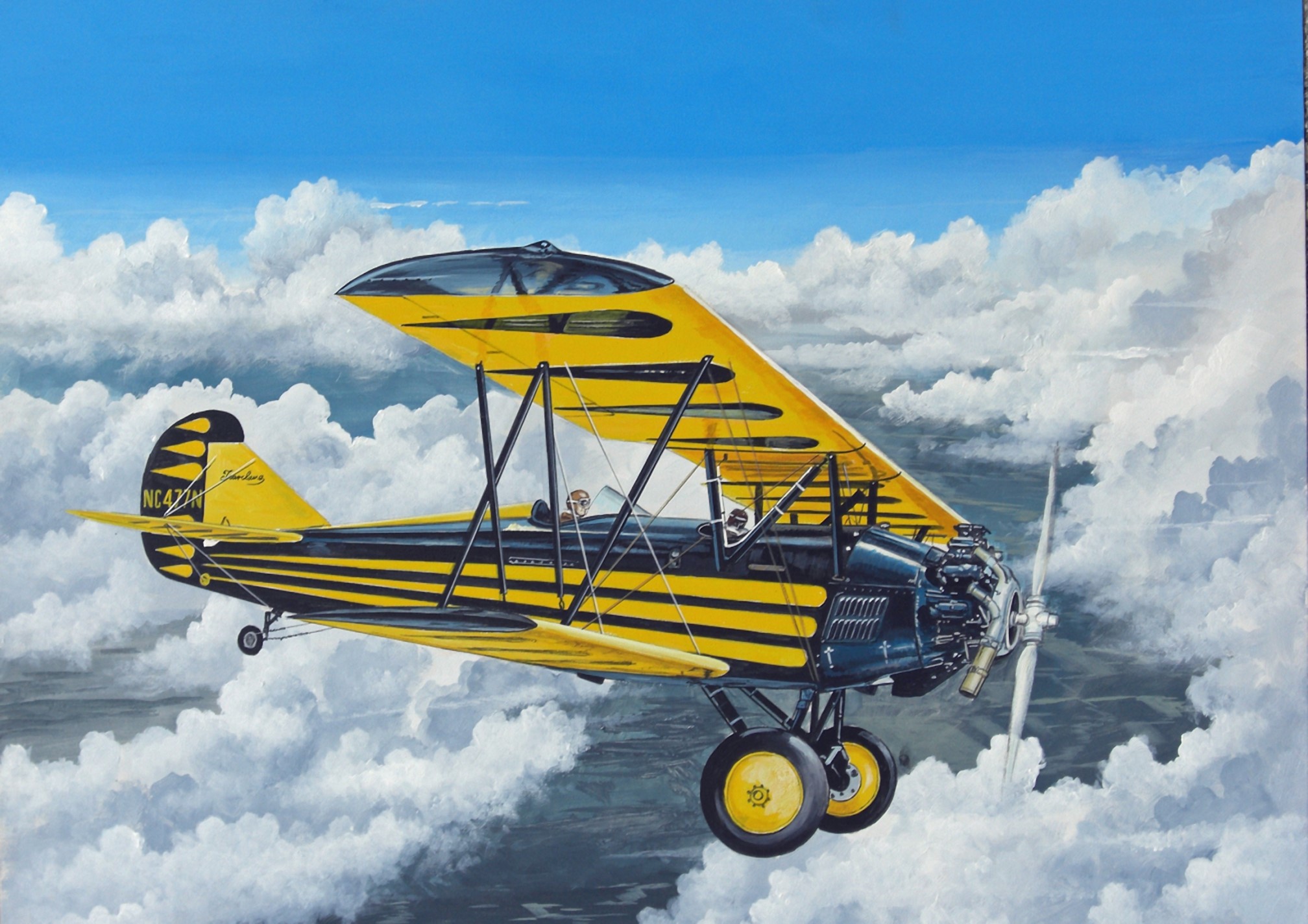 Yellow and black Travelaire biplane flying through clouds HD Wallpaper