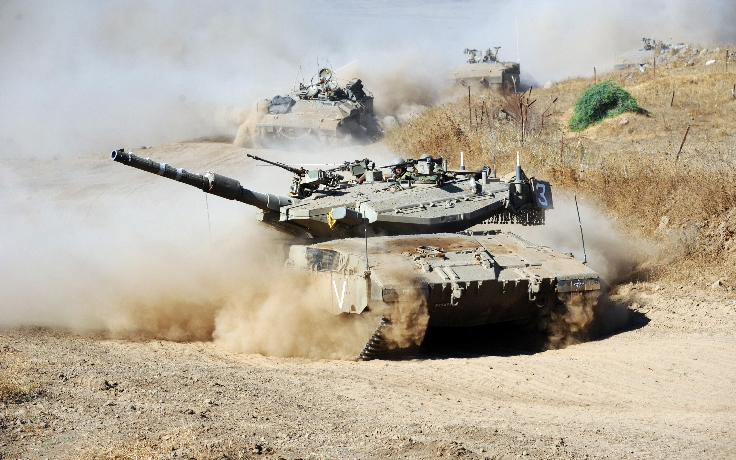 Tanks driving through dust HD Wallpaper