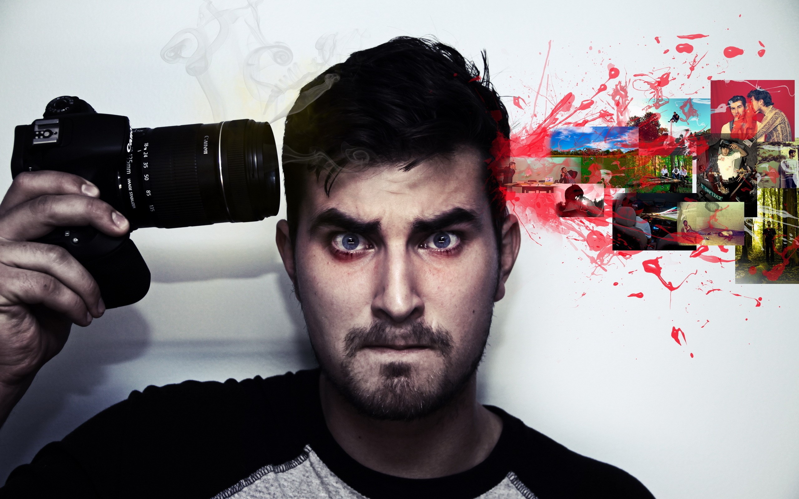 Man holding camera to head with images exploding from head HD Wallpaper