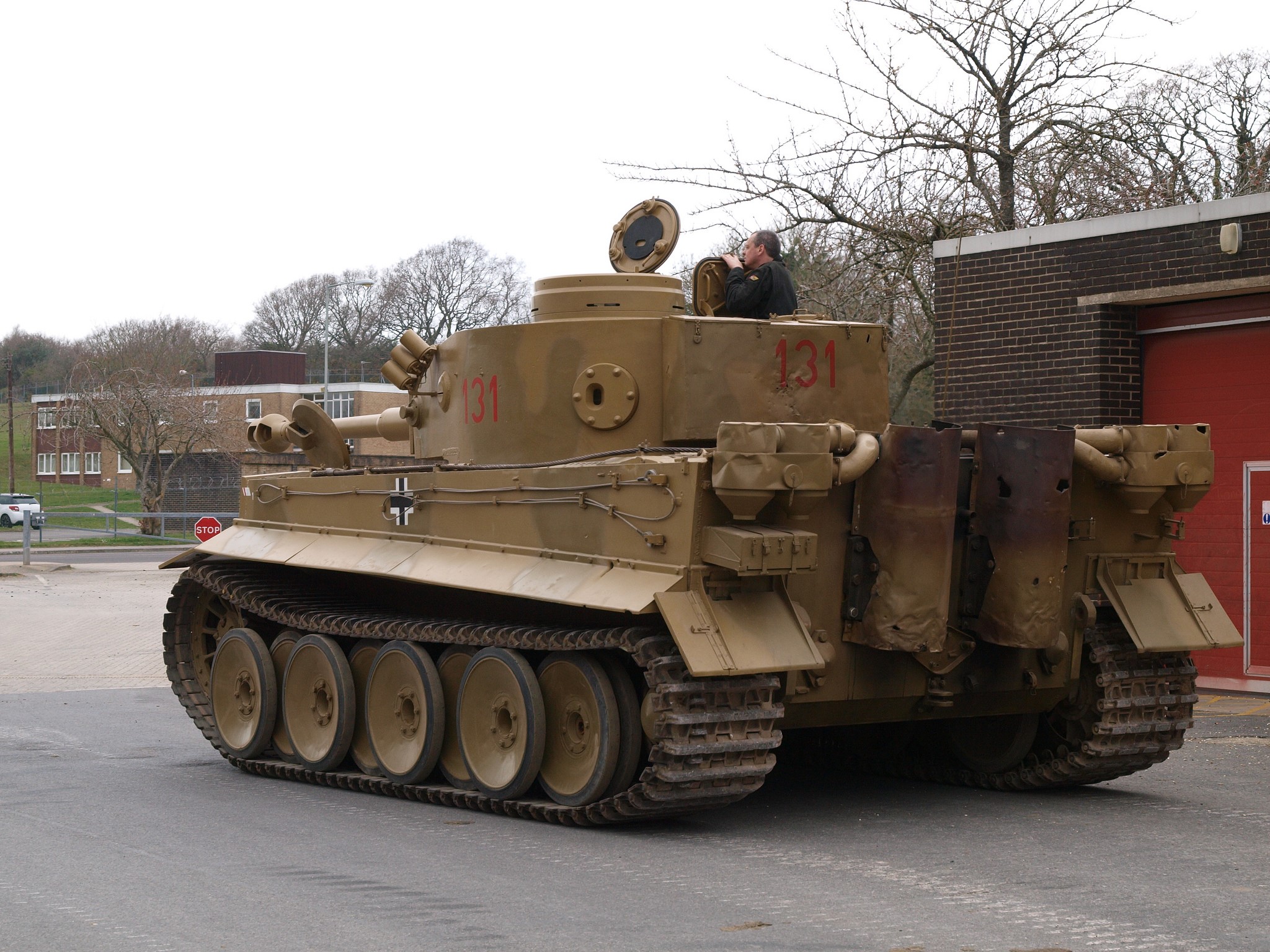 Tiger tank with a man in the turret HD Wallpaper