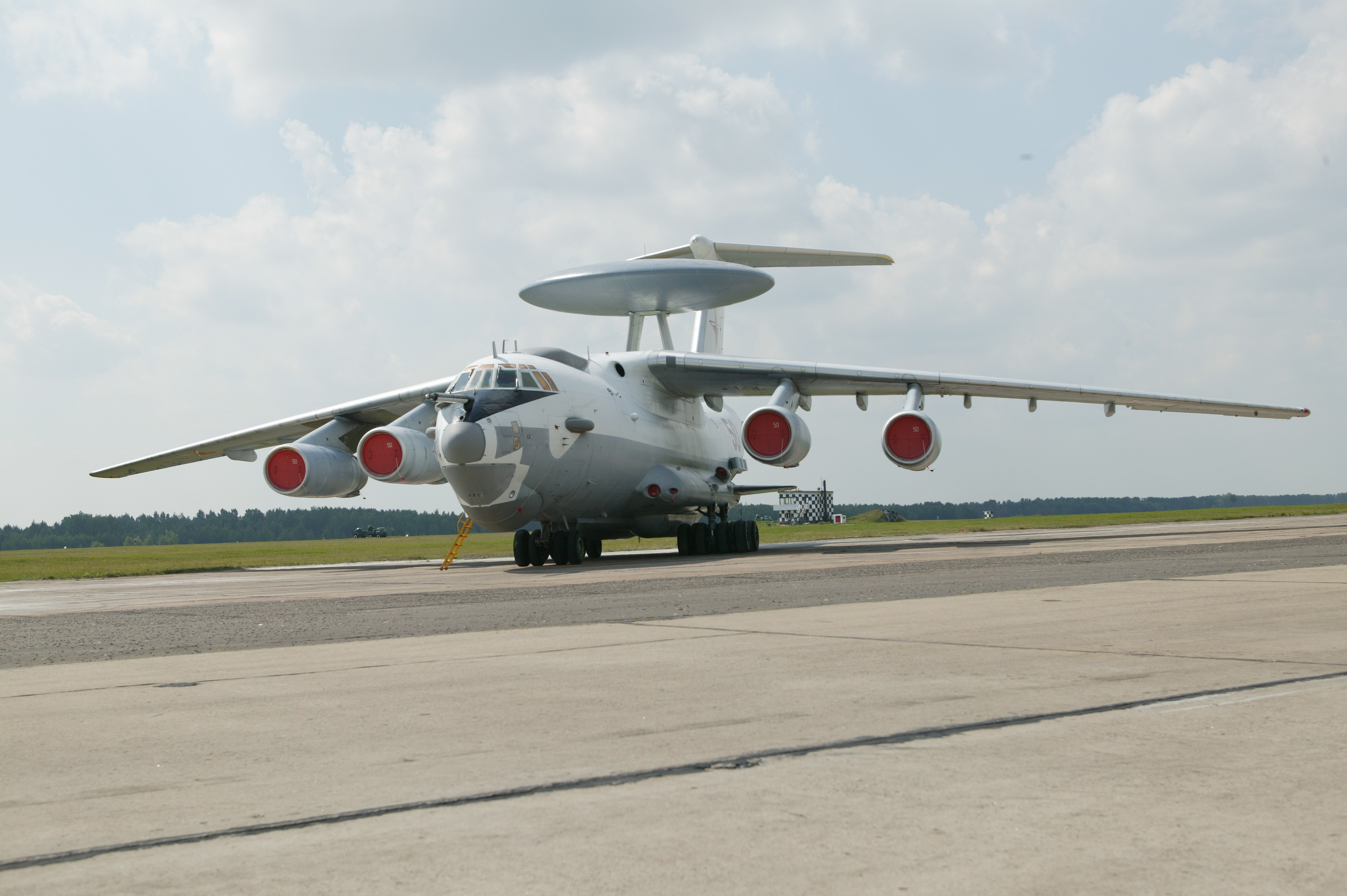 Airplane on a runway HD Wallpaper