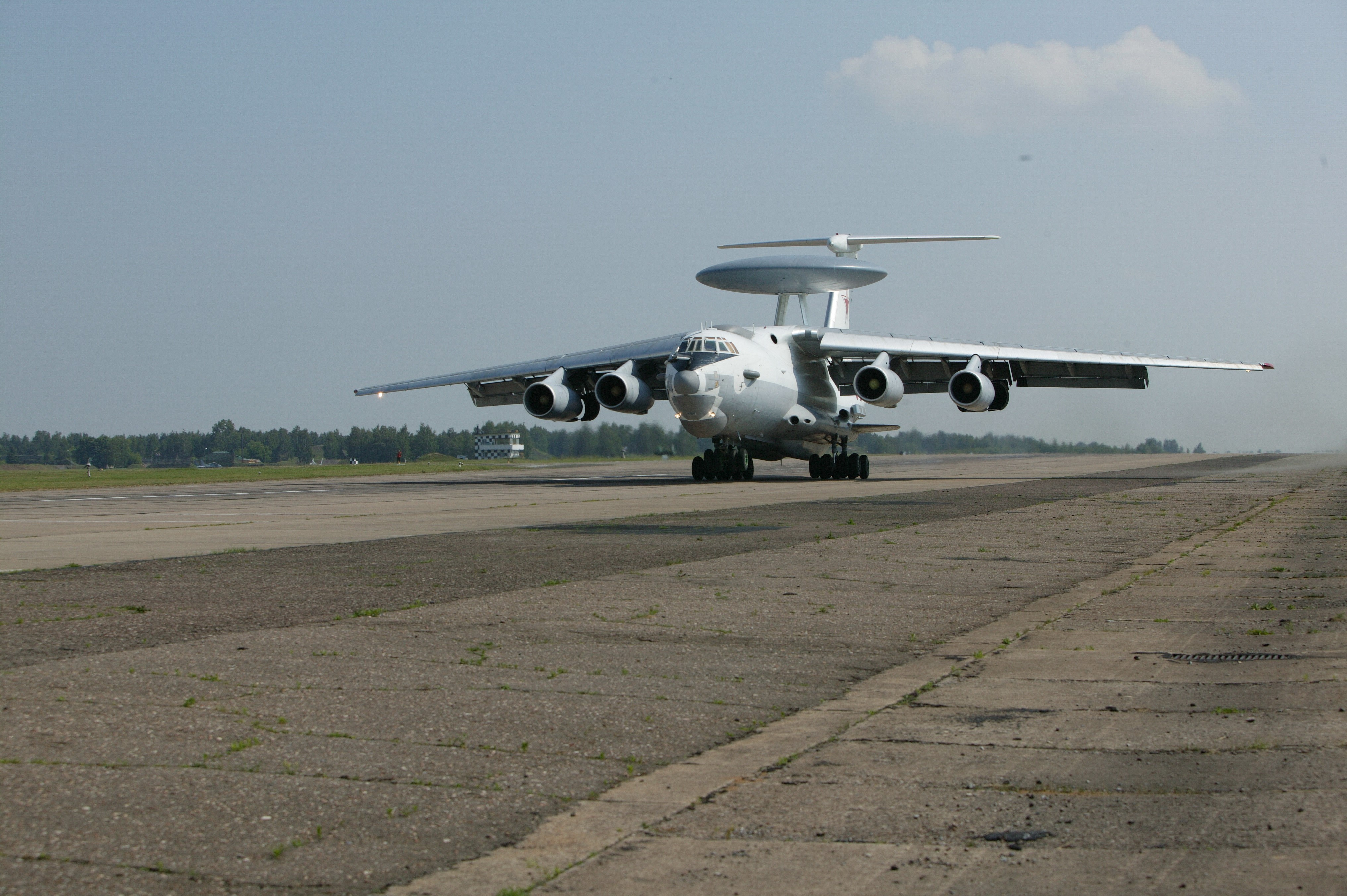 Airplane on a runway HD Wallpaper