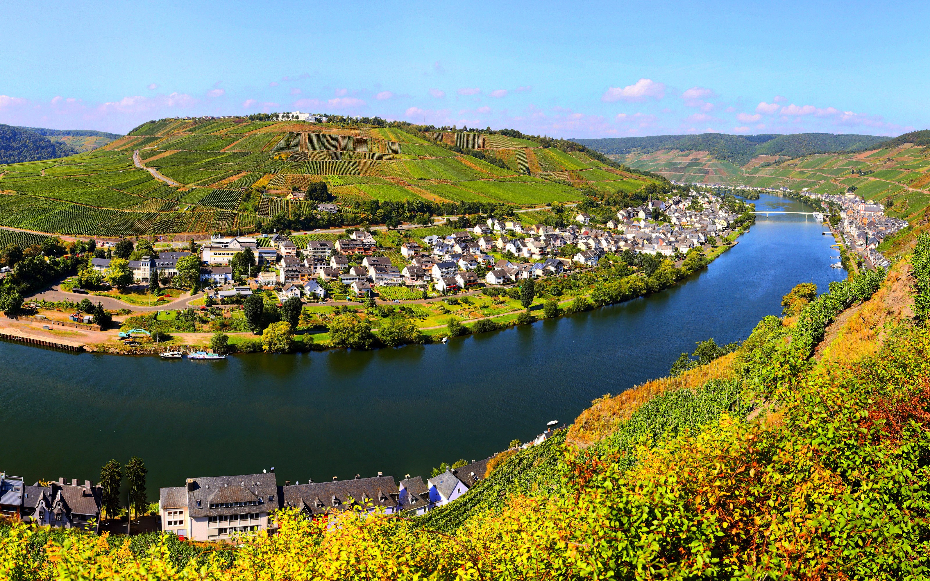 River valley with vineyards and village in Germany HD Wallpaper